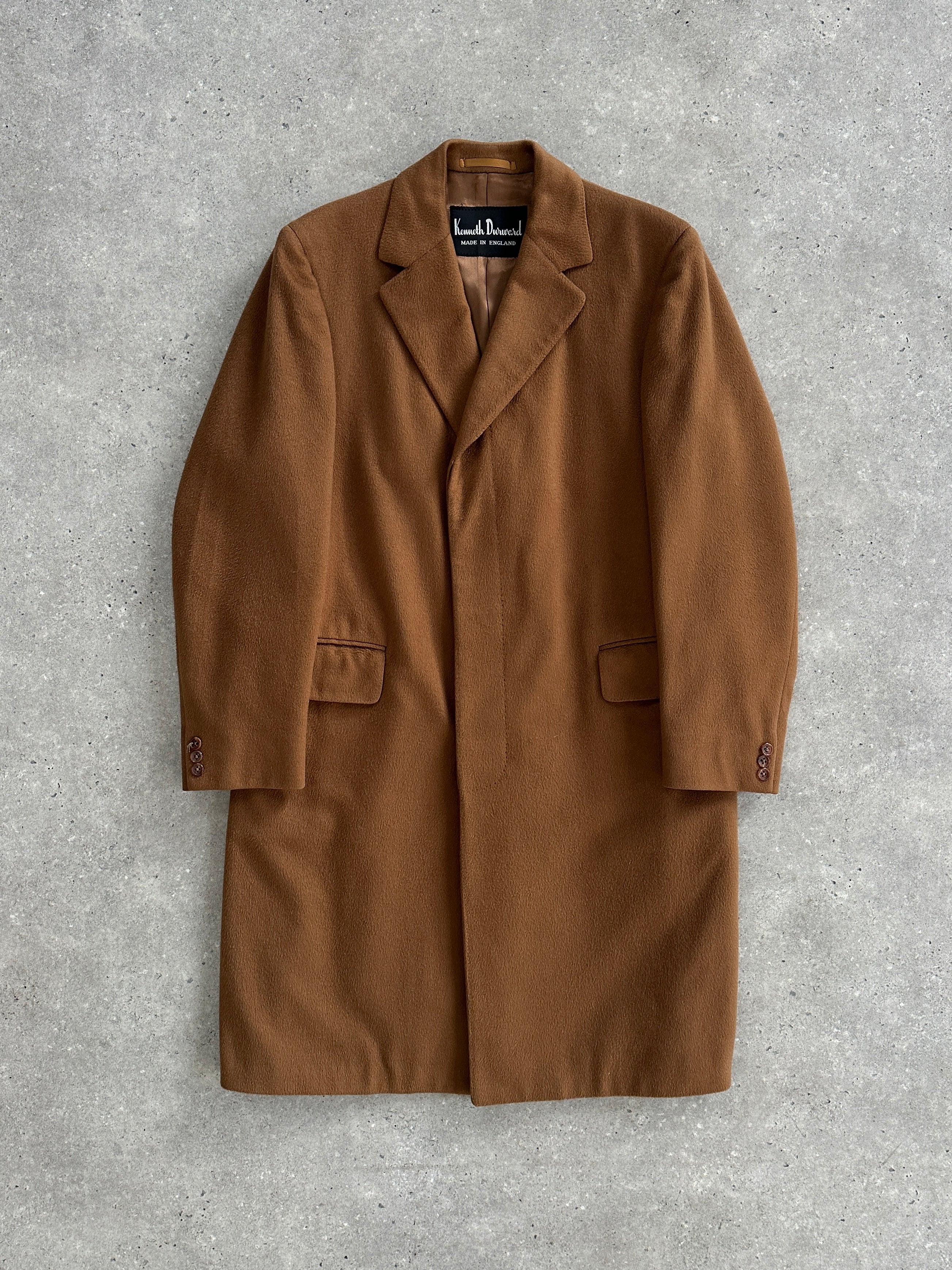 Vintage pure cashmere coat with concealed placket, in size large/X-large, showcasing a sleek, elegant outerwear design.