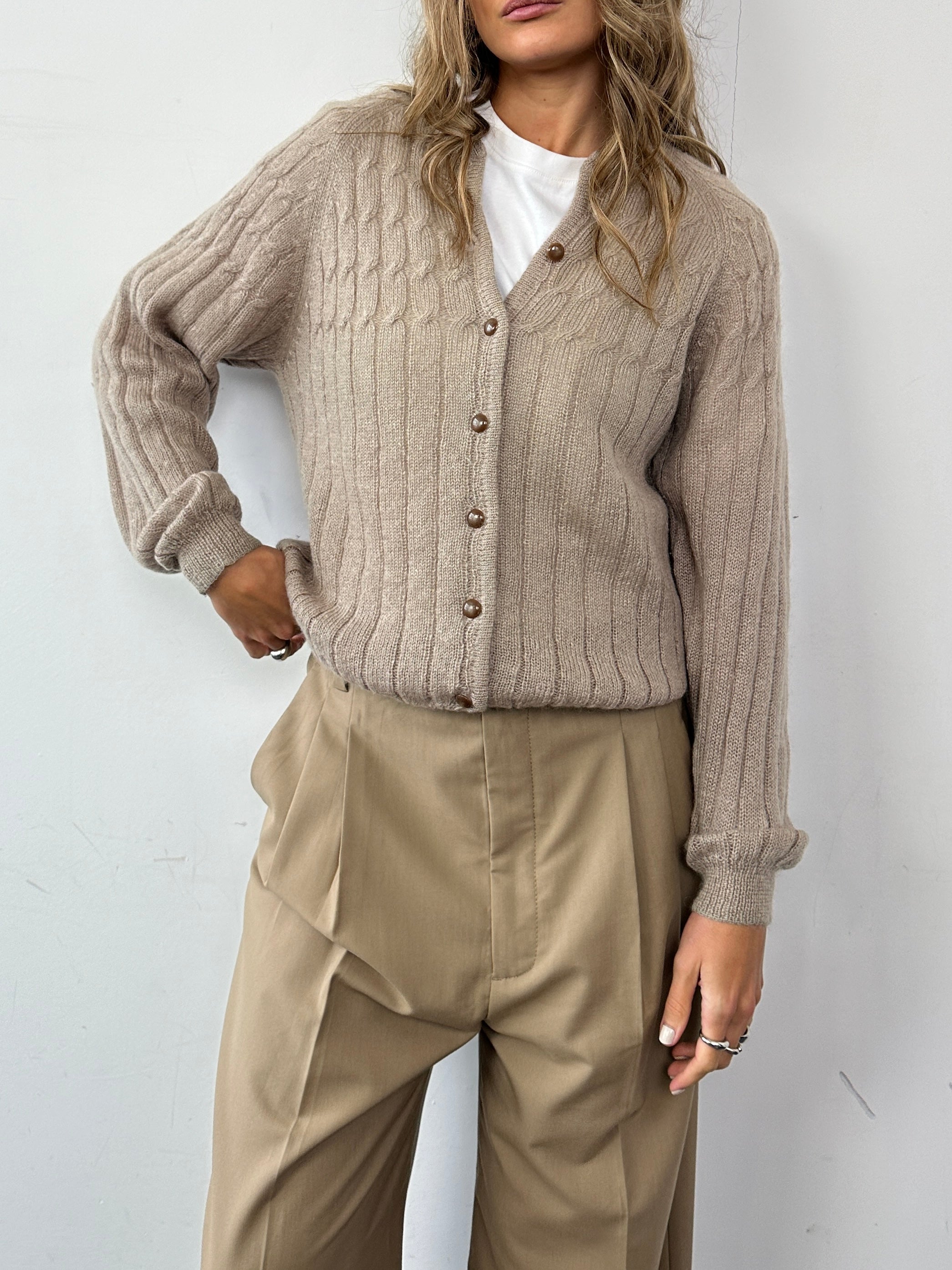 Italian vintage mohair knitted cardigan in size M, featuring soft textured fabric and classic design, displayed on a neutral background.