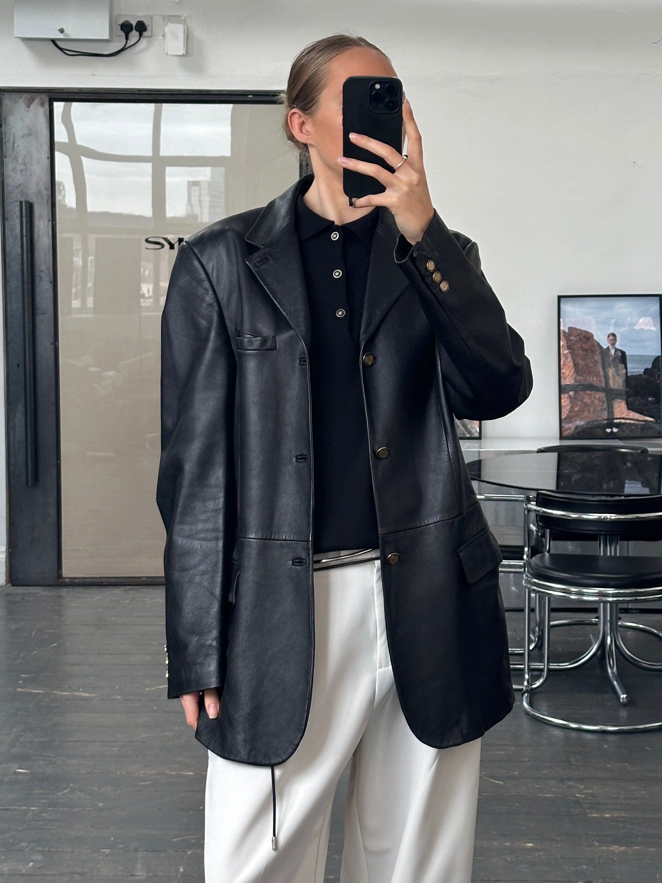 Versace Jeans Couture 1990s bespoke leather blazer jacket in black, featuring button details and tailored fit.