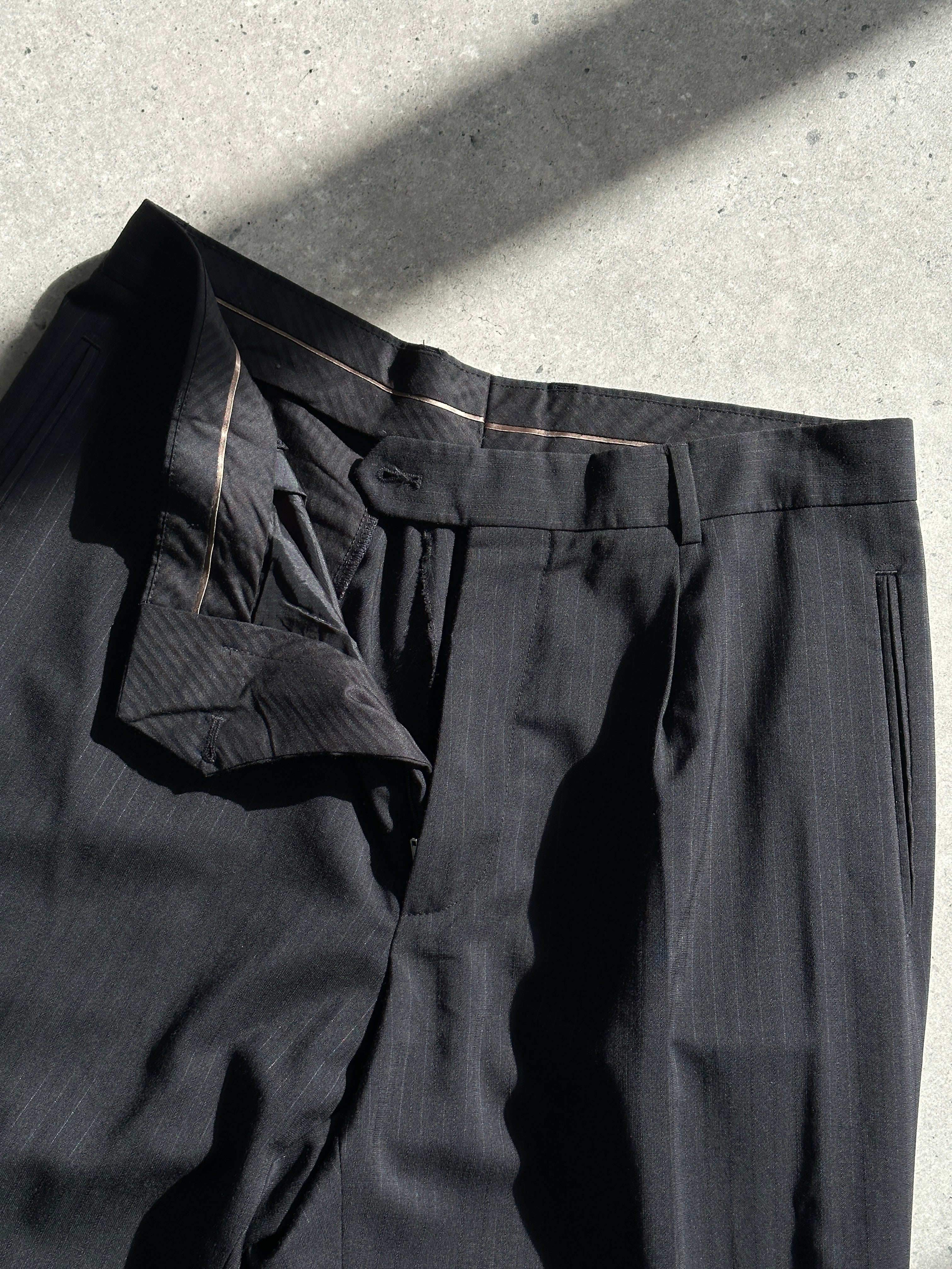 Vintage pinstripe virgin wool tailored tall trousers with pleats and a high waist, W32, featuring a classic fit and sharp pleated design.