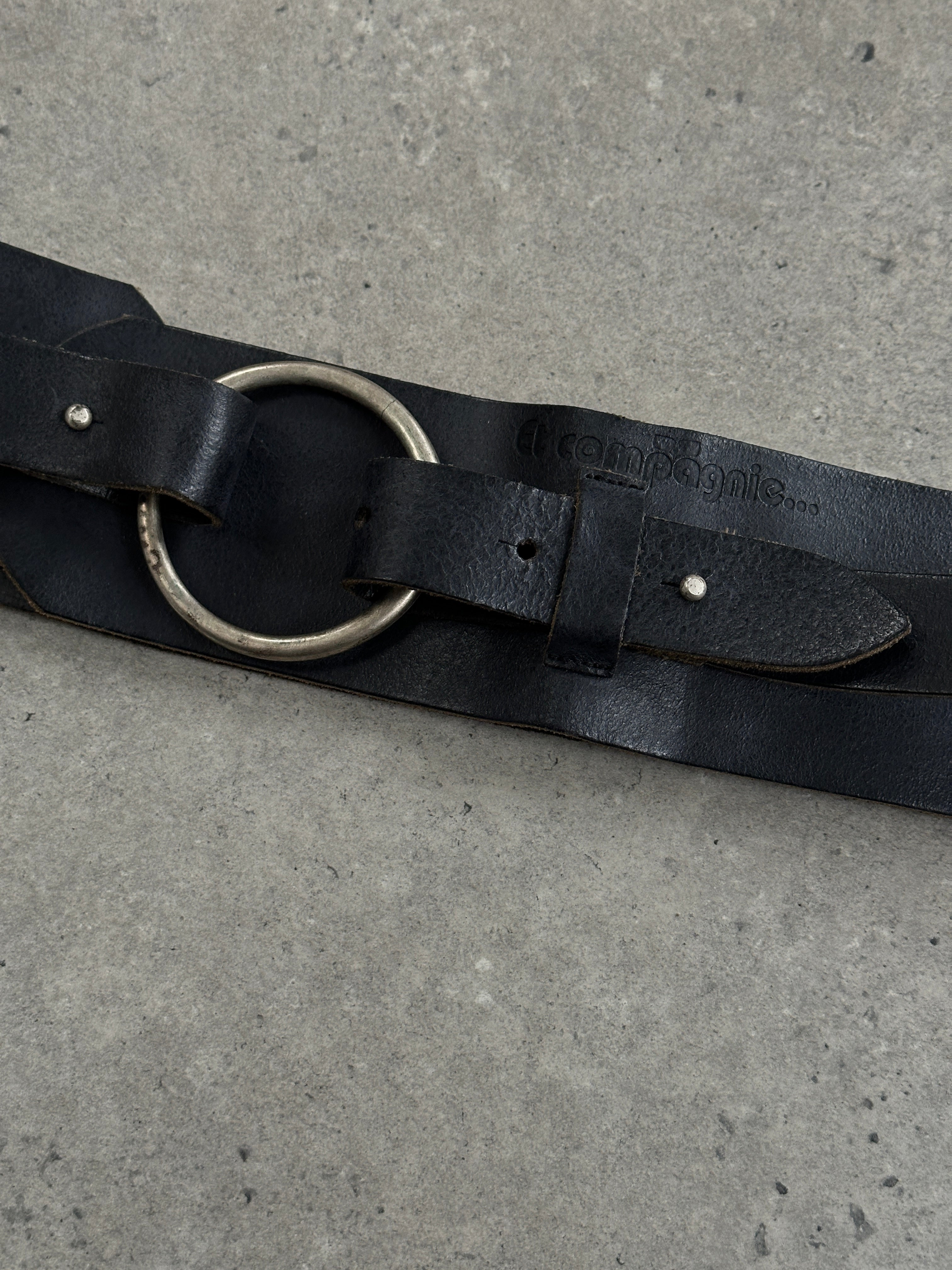 Vintage 1990s chunky leather belt with studded design, featuring a French vintage style, adjustable W32-36.