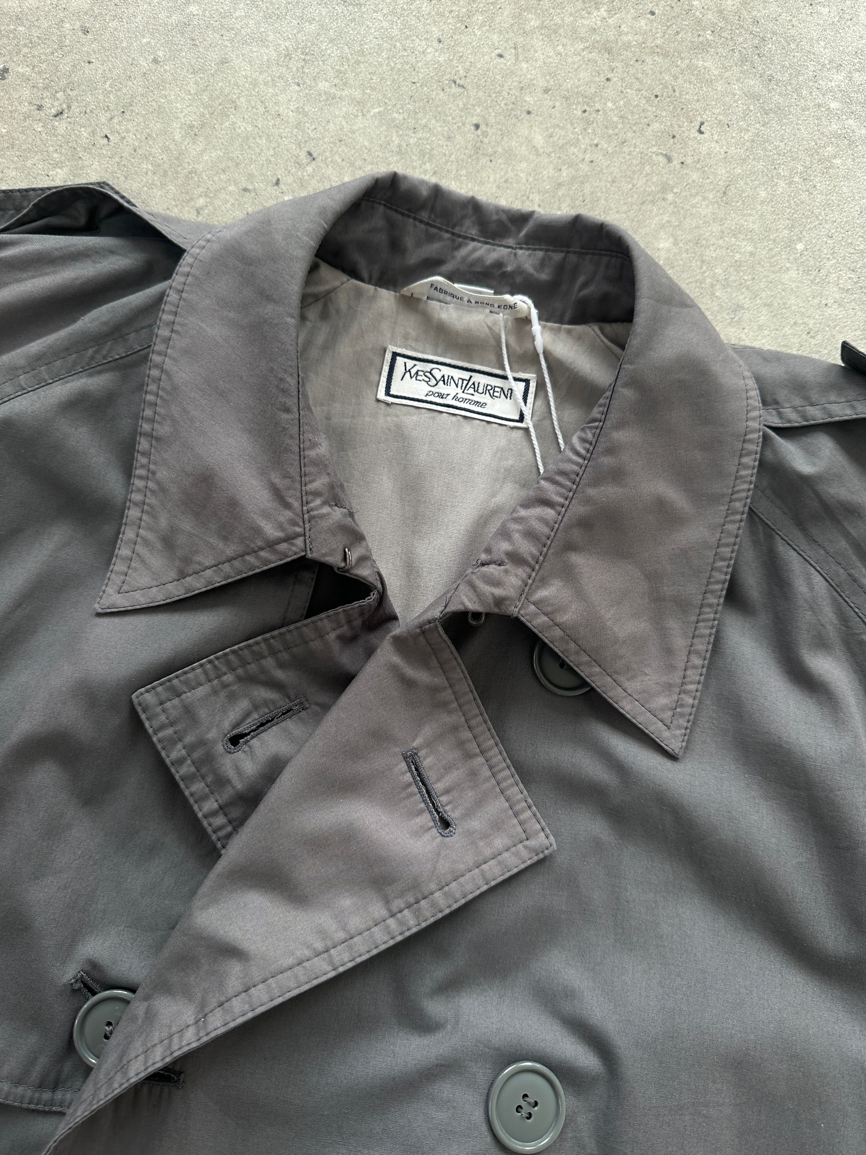 Yves Saint Laurent men's double-breasted belted trench coat in XL/XXL, showcasing classic design and tailored fit.