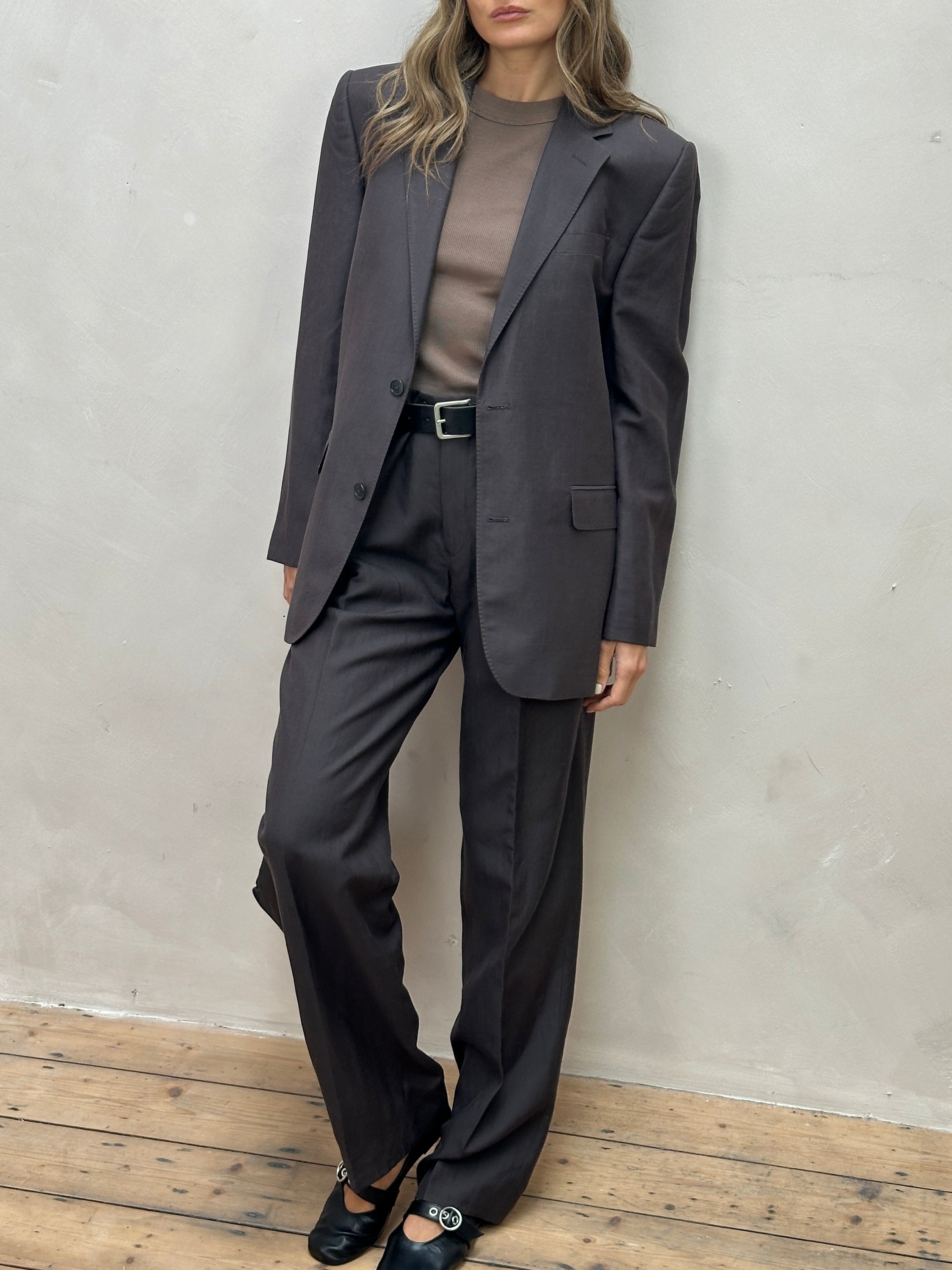 Jaeger silk linen single-breasted jumpsuit in size 40R/34L, featuring a tailored fit with lapel collar and front buttons.