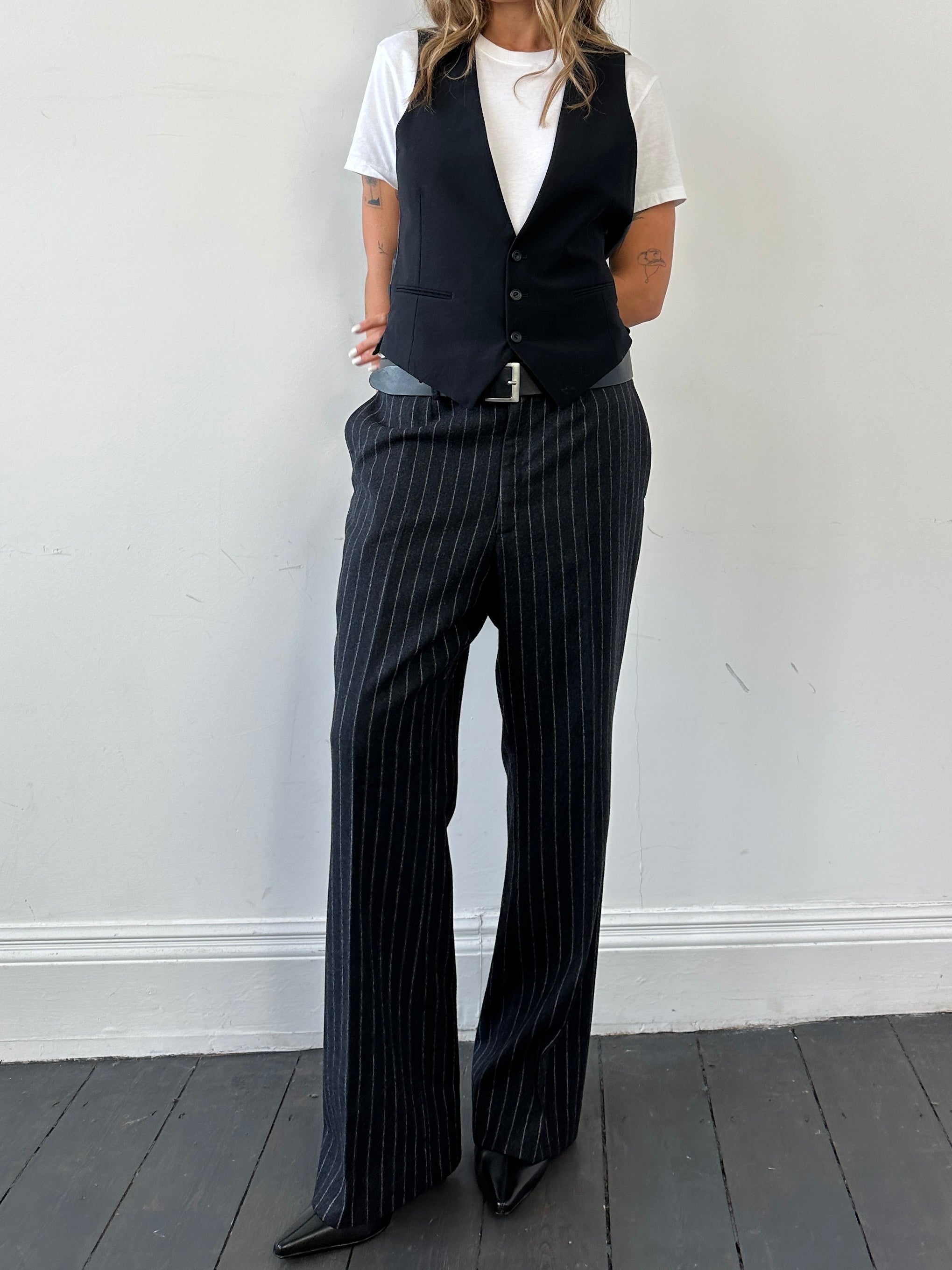 Christian Dior wool tailored waistcoat in size M, featuring a classic design and refined fit, displayed on a neutral background.