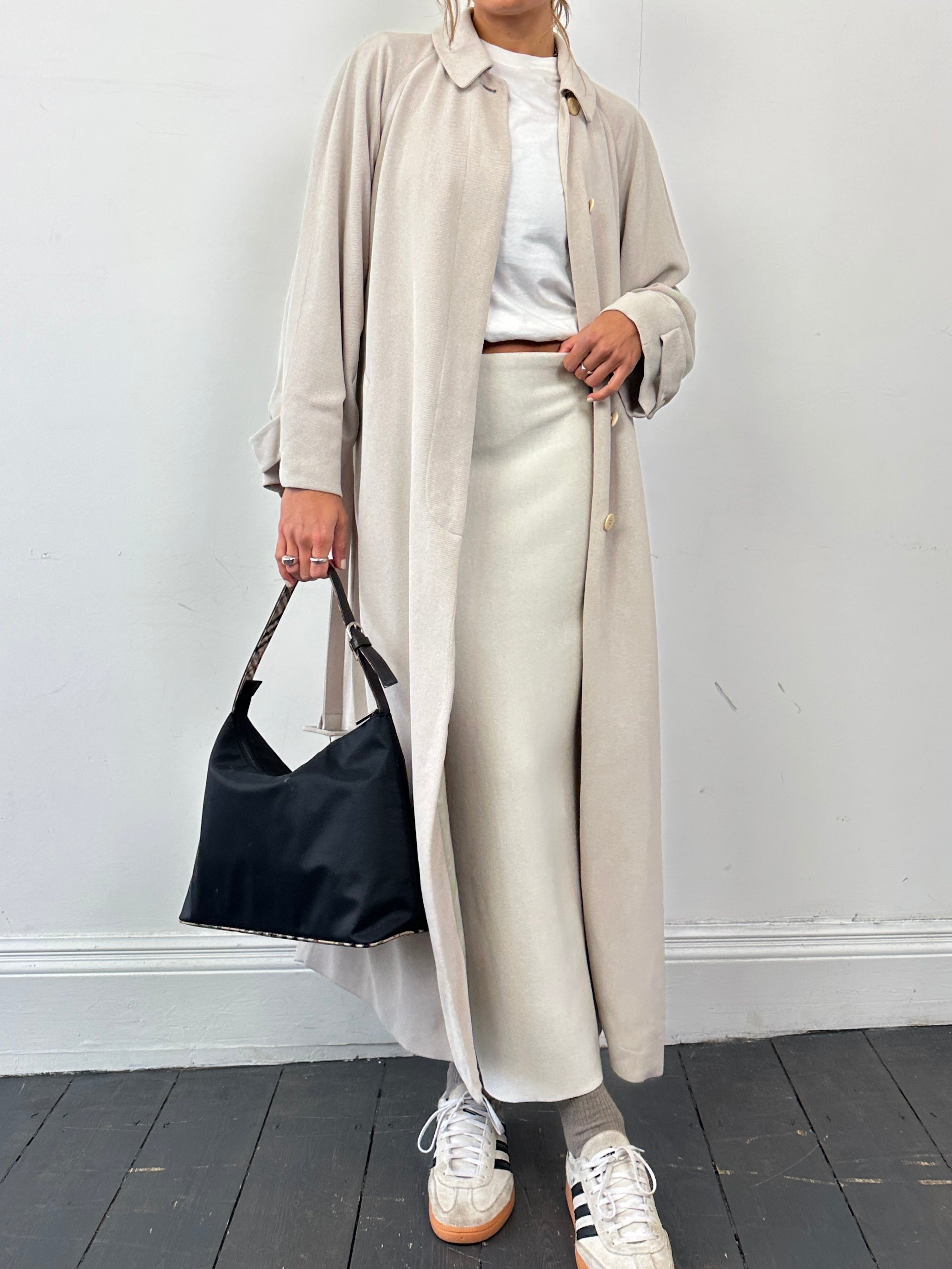 Giorgio Armani Le Collezioni wool floor-length belted coat in M/L, showcasing a tailored design with a belt at the waist.