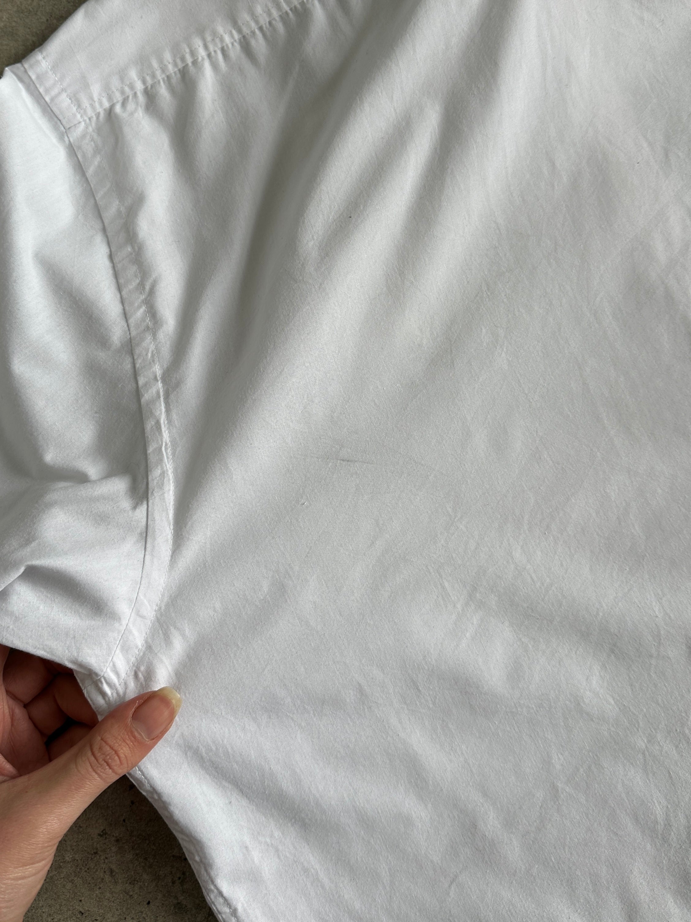 Yves Saint Laurent Pour Homme cotton logo shirt in XL, featuring a classic design with the brand's signature logo on the front.