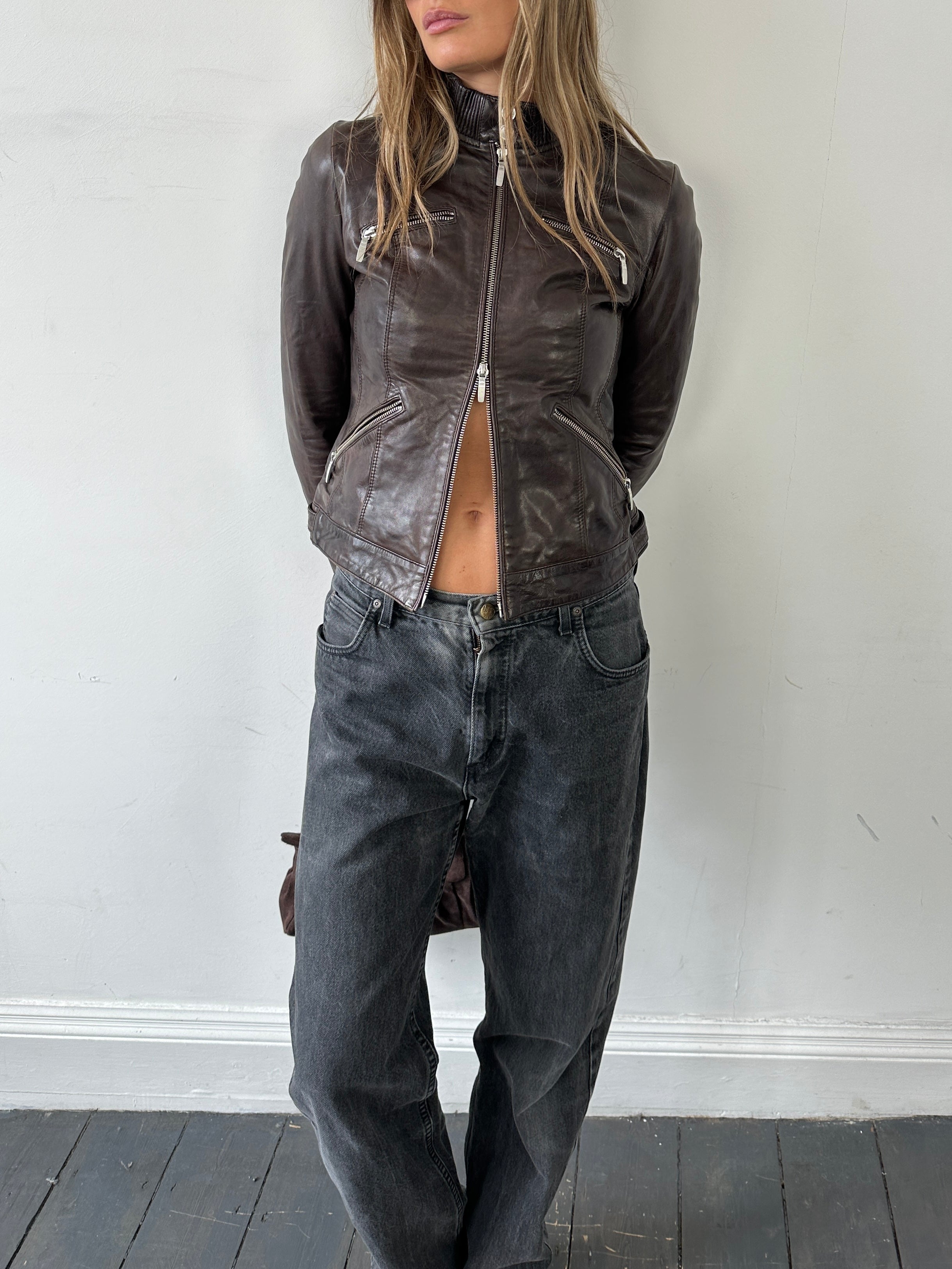 Vintage double zip fitted biker leather jacket in XS/S, featuring classic design, durable leather, and stylish double zipper details.