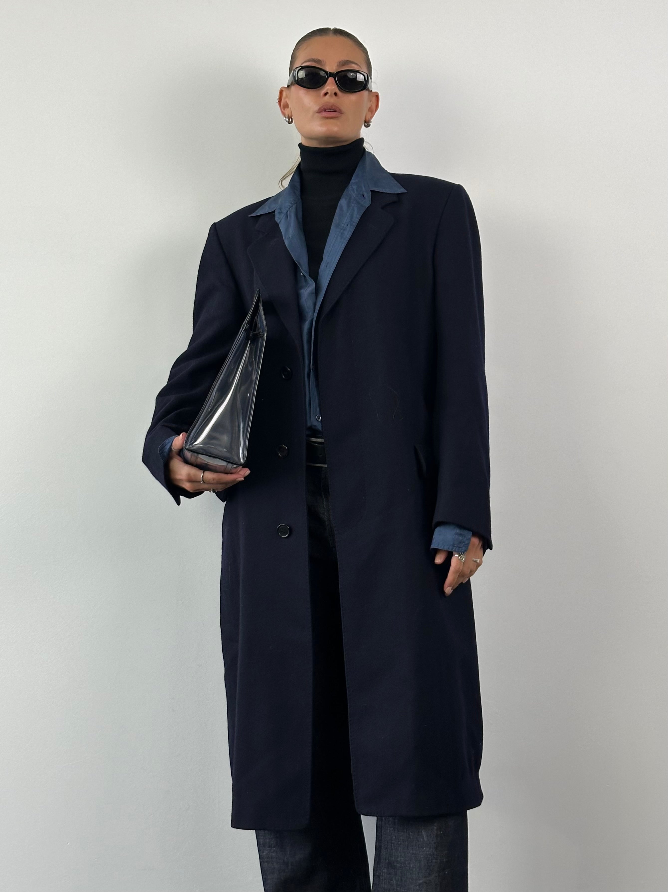 Christian Dior XL wool coat with concealed placket, classic design and tailored fit, displayed on a hanger.