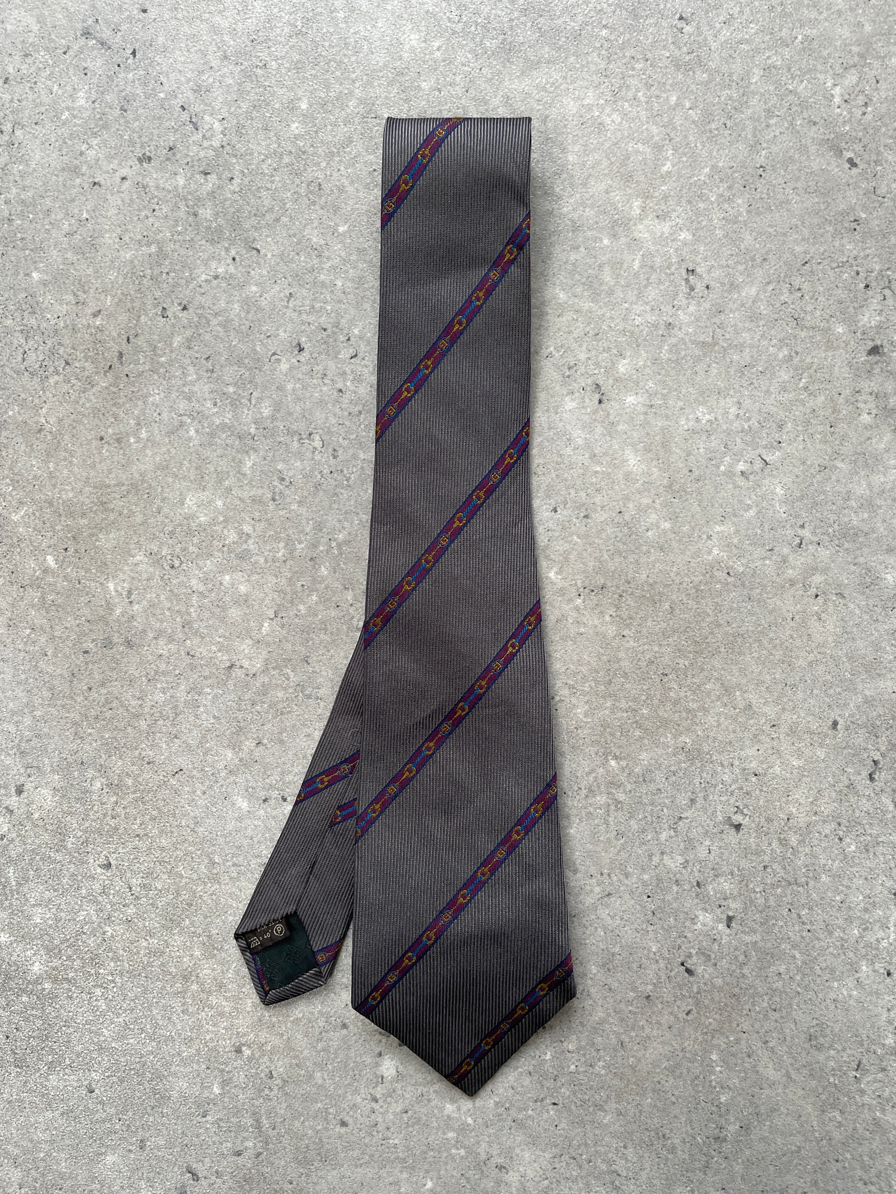 Givenchy 1990s pure silk diagonal stripe tie, featuring classic design and elegant craftsmanship, displayed flat.