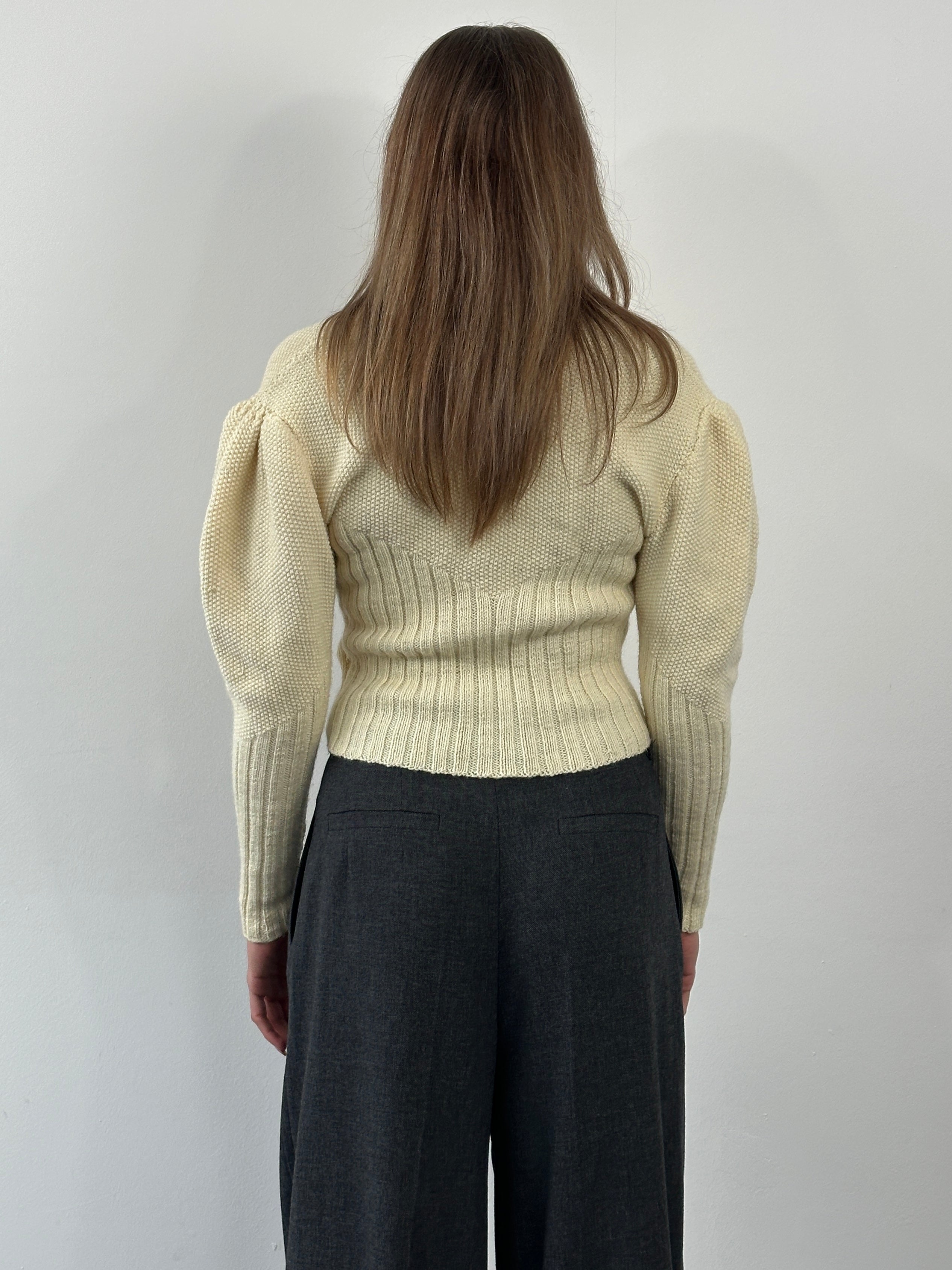 Vintage 1980s wool puff sleeve knitted cardigan in cream with ribbed cuffs and neckline, size S/M, classic retro style.