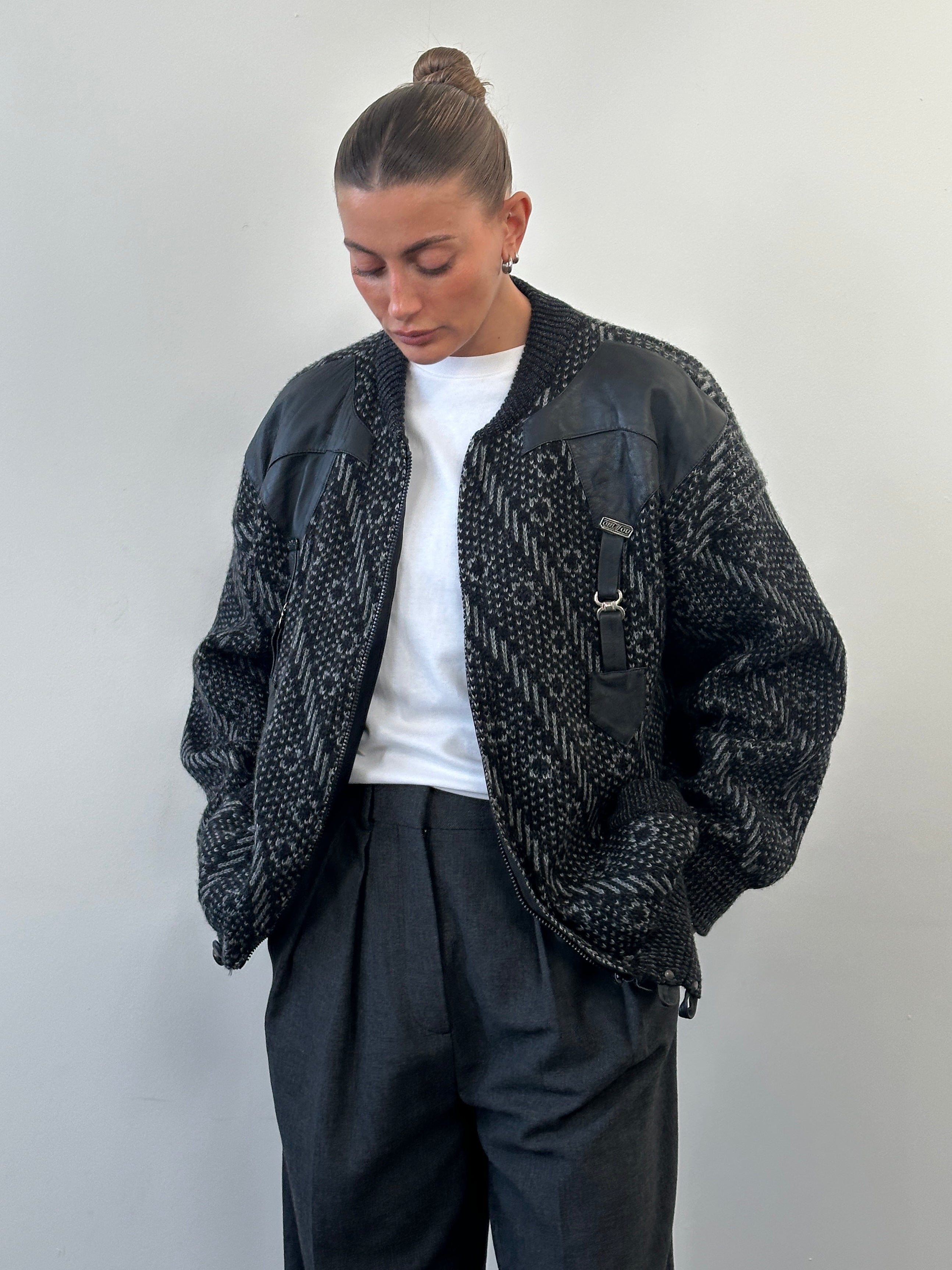 Vintage 1980s wool print knit bomber jacket in XL, featuring a colorful retro pattern and classic bomber style.