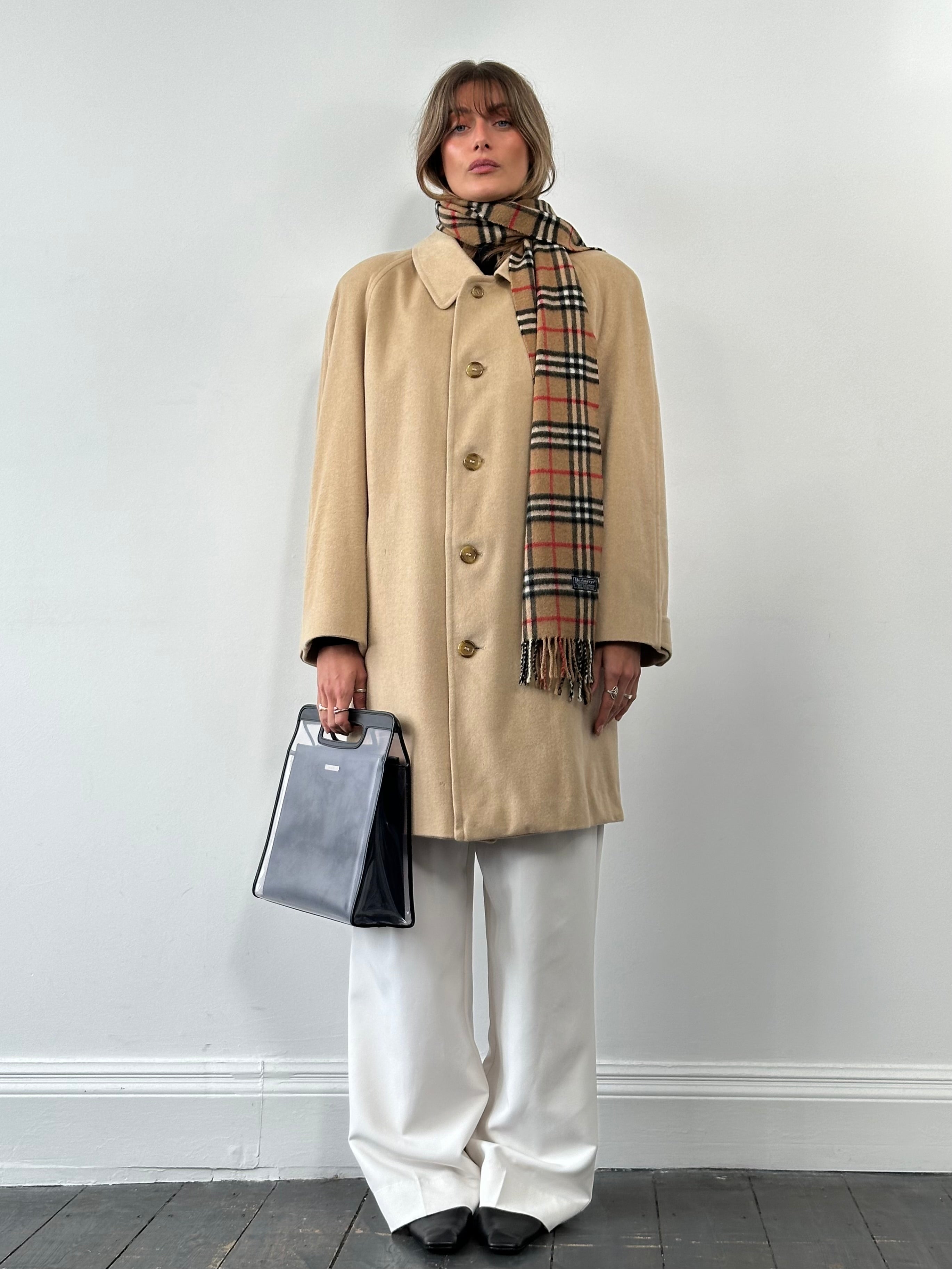 Burberry pure cashmere double-faced single-breasted coat in size L, shown in a stylish outerwear image.