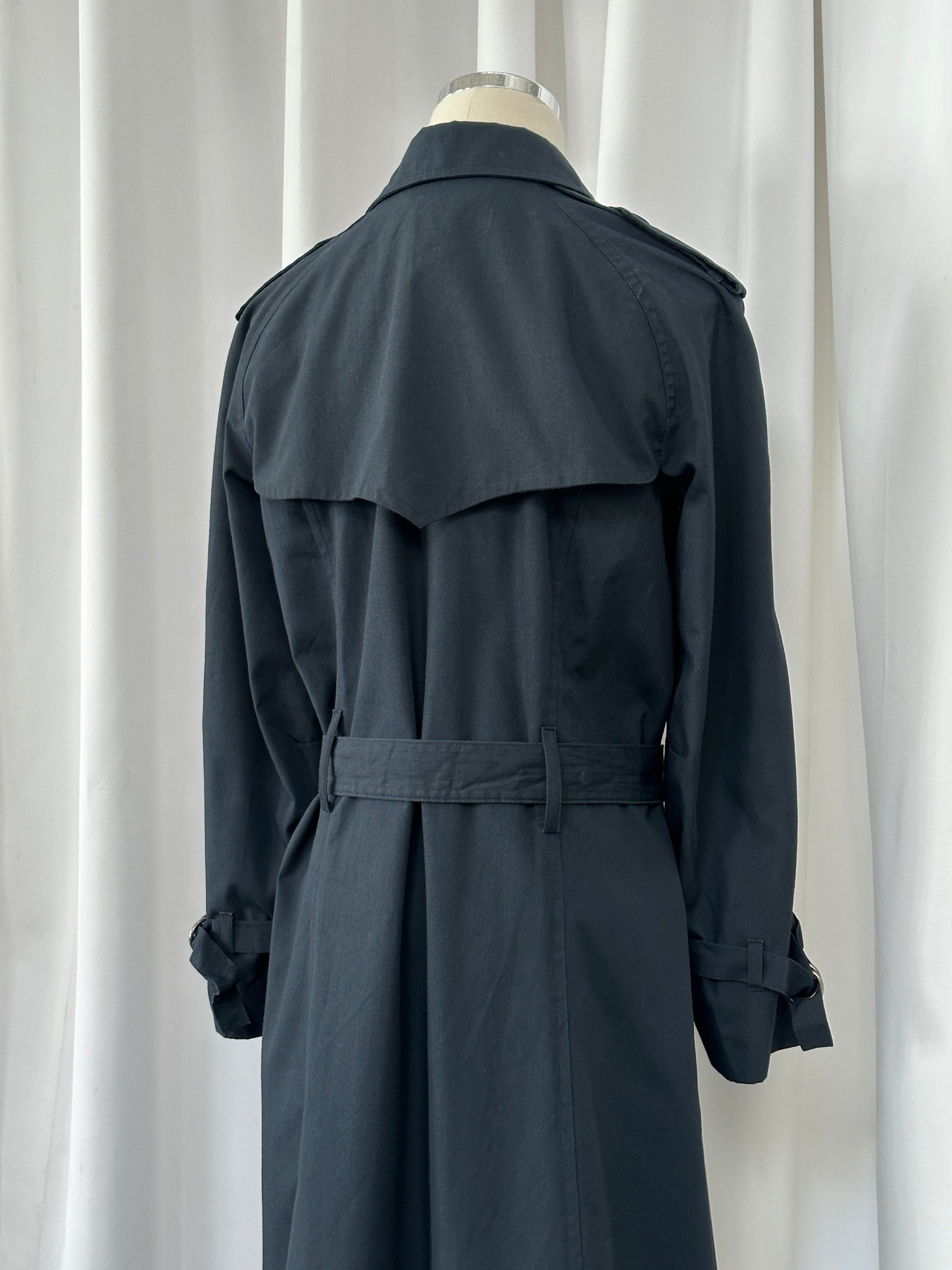 London Fog 1980s double-breasted cotton trench coat in size S, shown on a hanger with classic beige color and belted design.