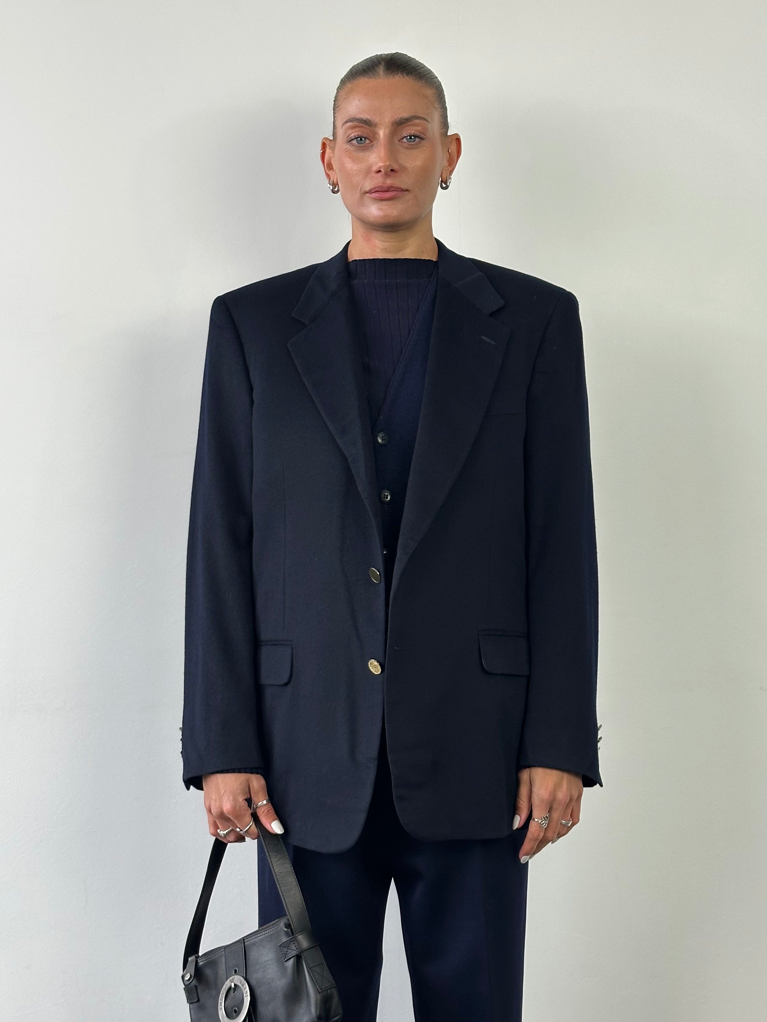 Loro Piana brushed wool single-breasted blazer in size L, tailored fit with classic lapel and button closure, in neutral tone.