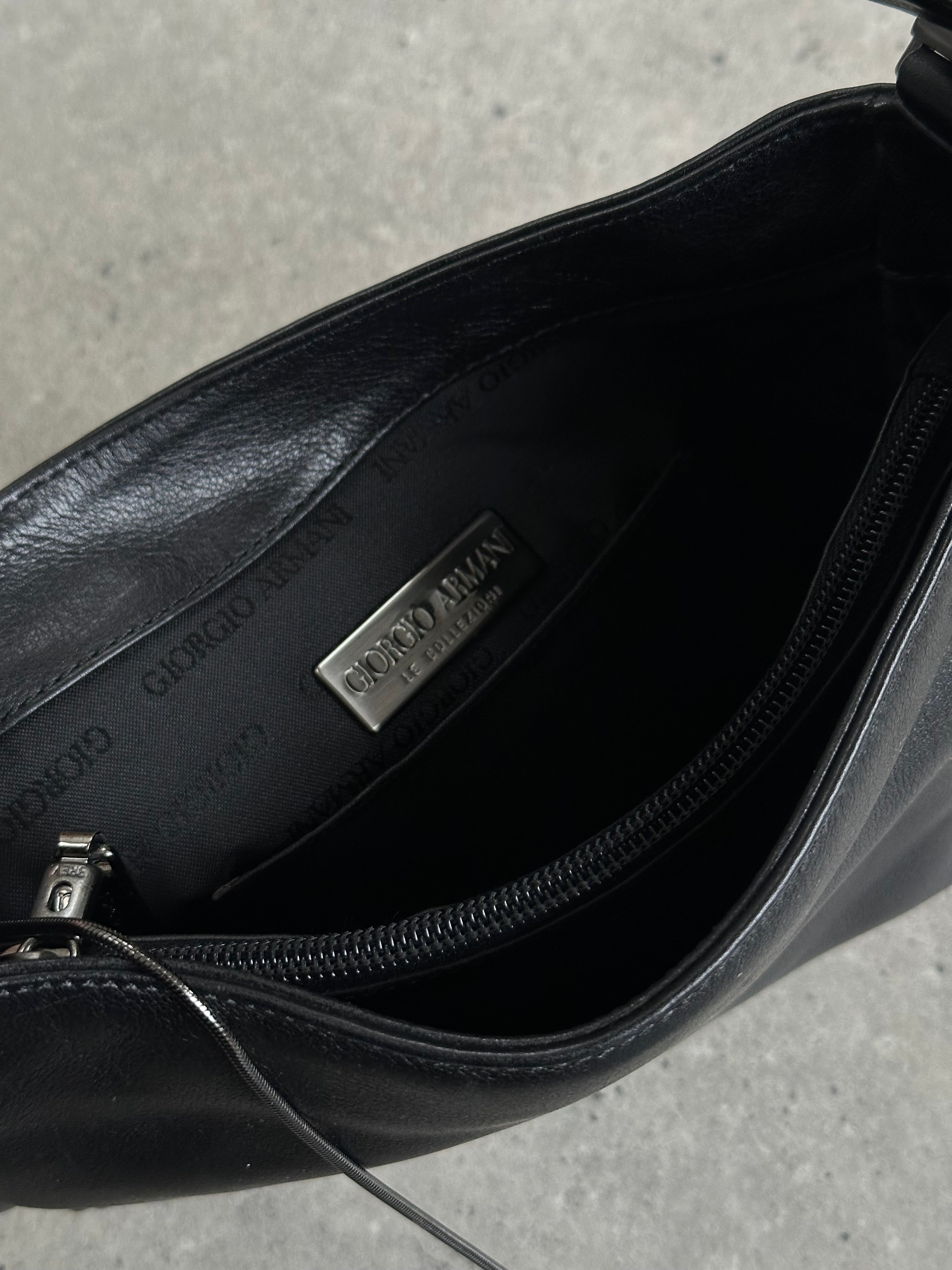 Giorgio Armani 2000s leather shoulder bag with sleek design, featuring a smooth leather surface and elegant shoulder strap.