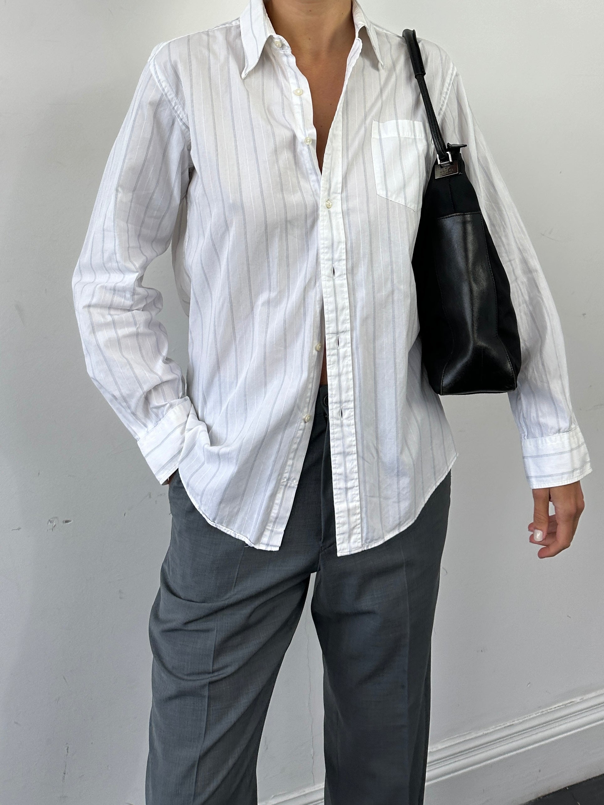 Yves Saint Laurent pinstripe cotton shirt in size M, featuring a classic button-down design with a tailored fit.