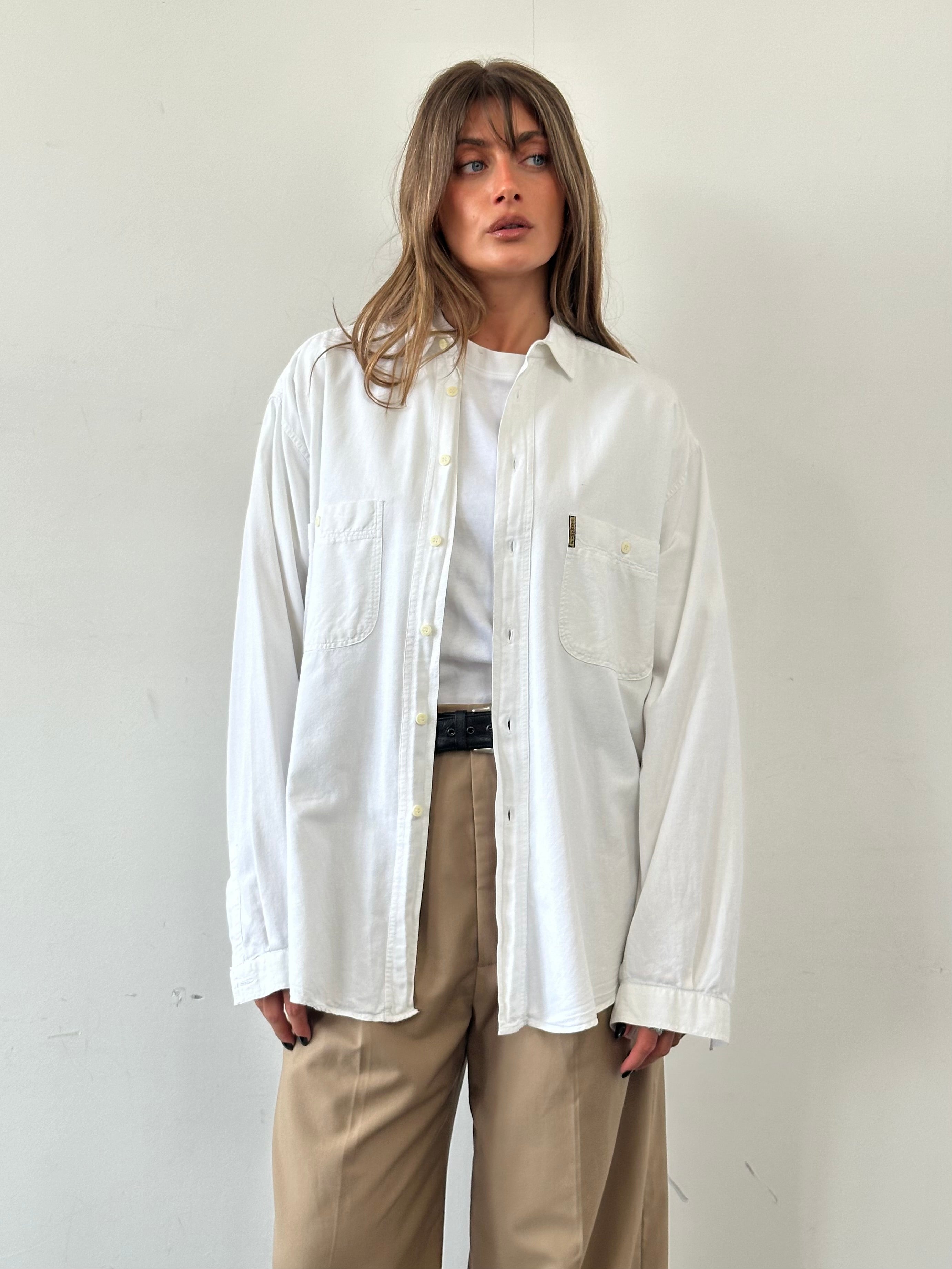 Armani Jeans cotton logo shirt in size XL, featuring a classic design with the Armani branding visible on the front.
