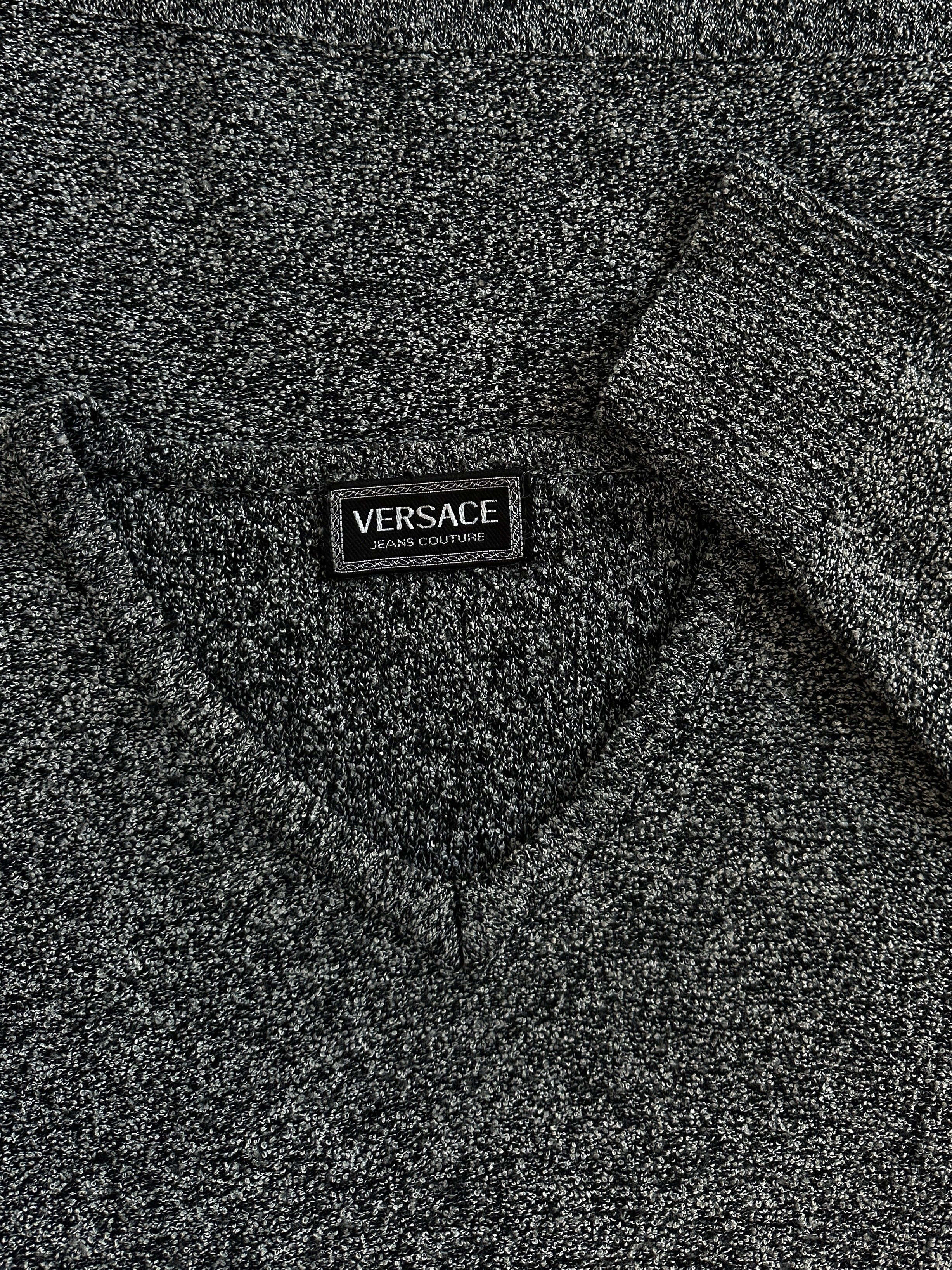 Versace Jeans Couture 1990s wool V-neck jumper in XL, showcasing a stylish knitted sweater with brand logo and classic design.