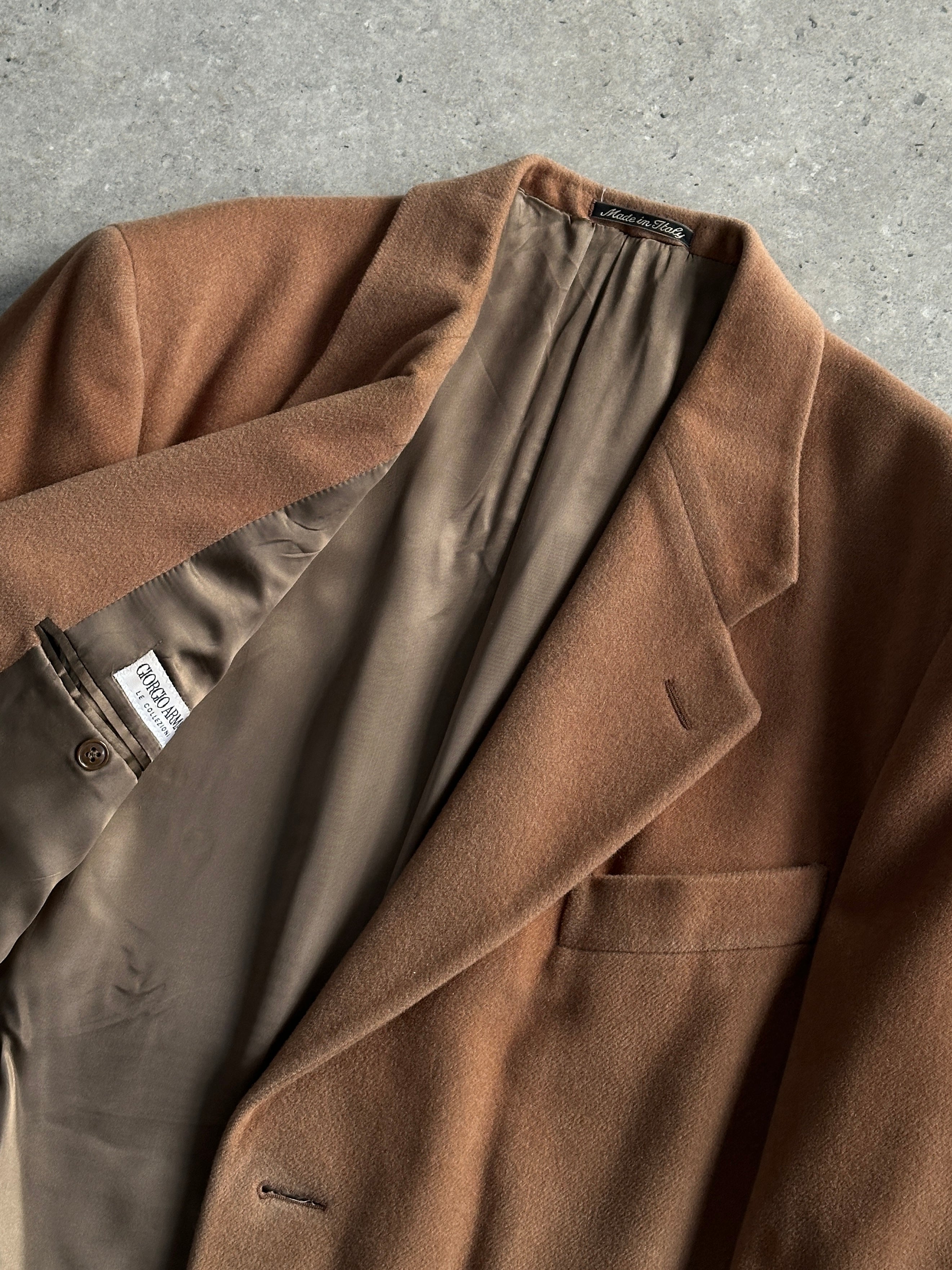 Giorgio Armani Le Collezioni wool cashmere single-breasted coat in XL, tailored fit, neutral color, displayed hanging or on model.