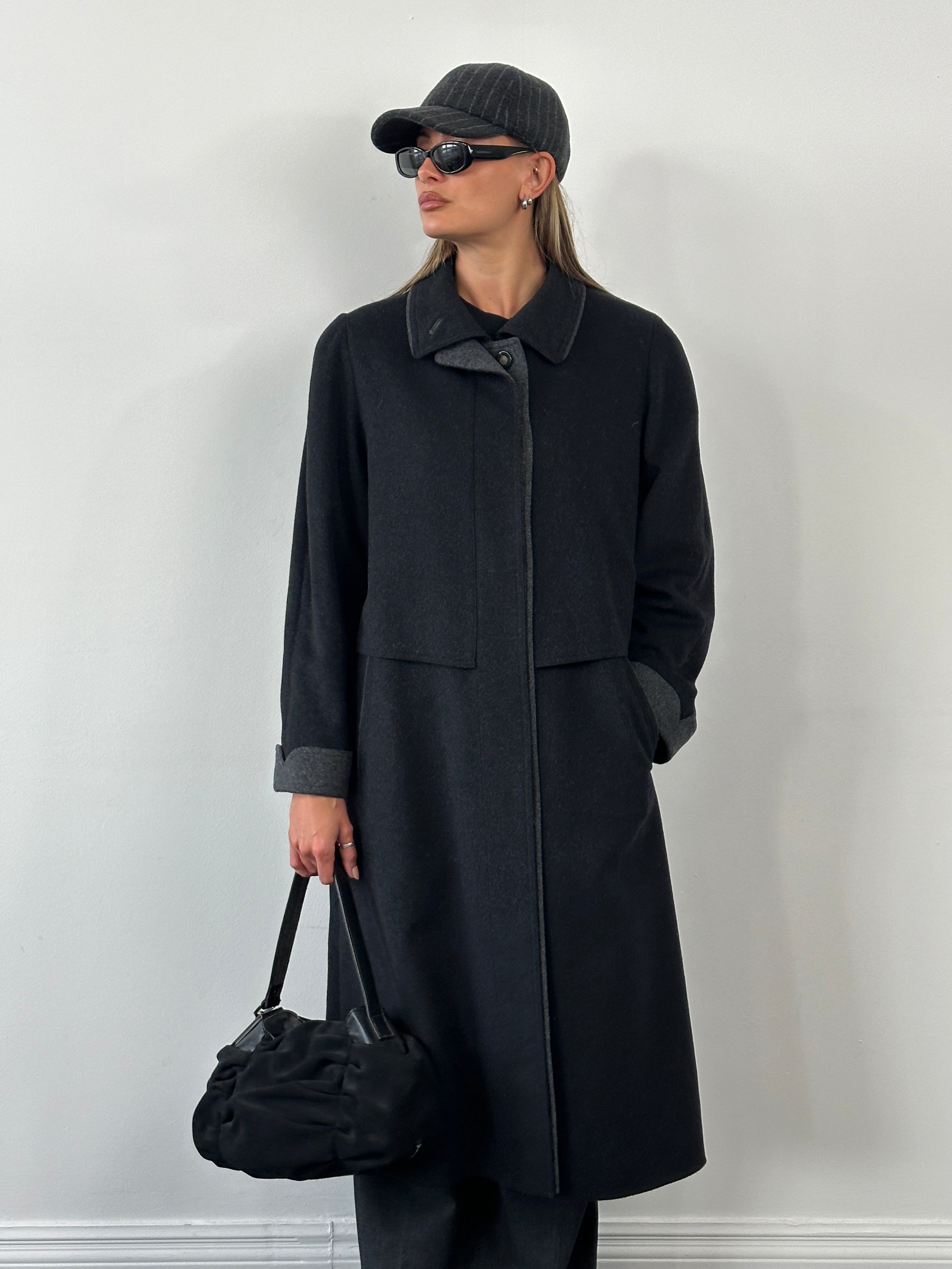 Vintage 1990s wool coat with concealed placket, size large, featuring classic design and textured fabric.