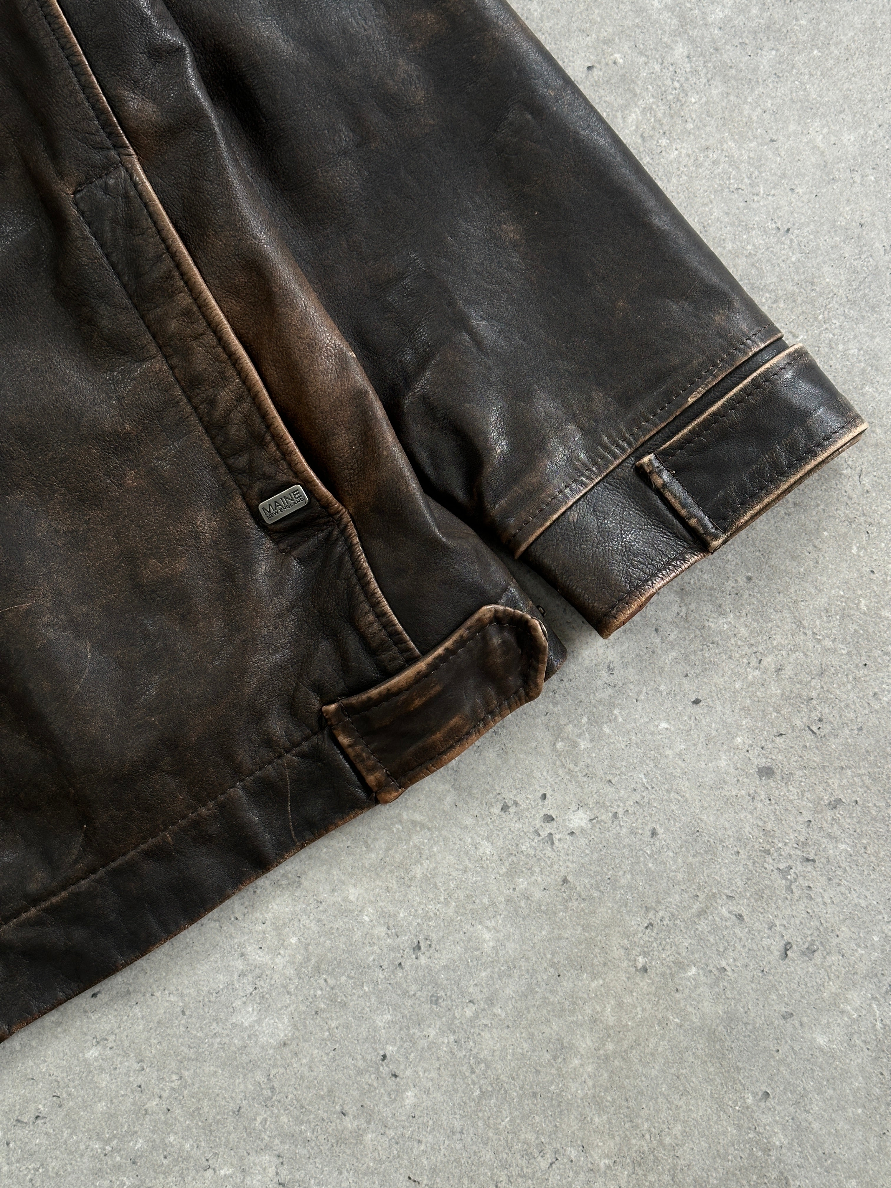 Vintage Moto aged leather jacket in size L, featuring a classic rugged design and distressed leather finish.