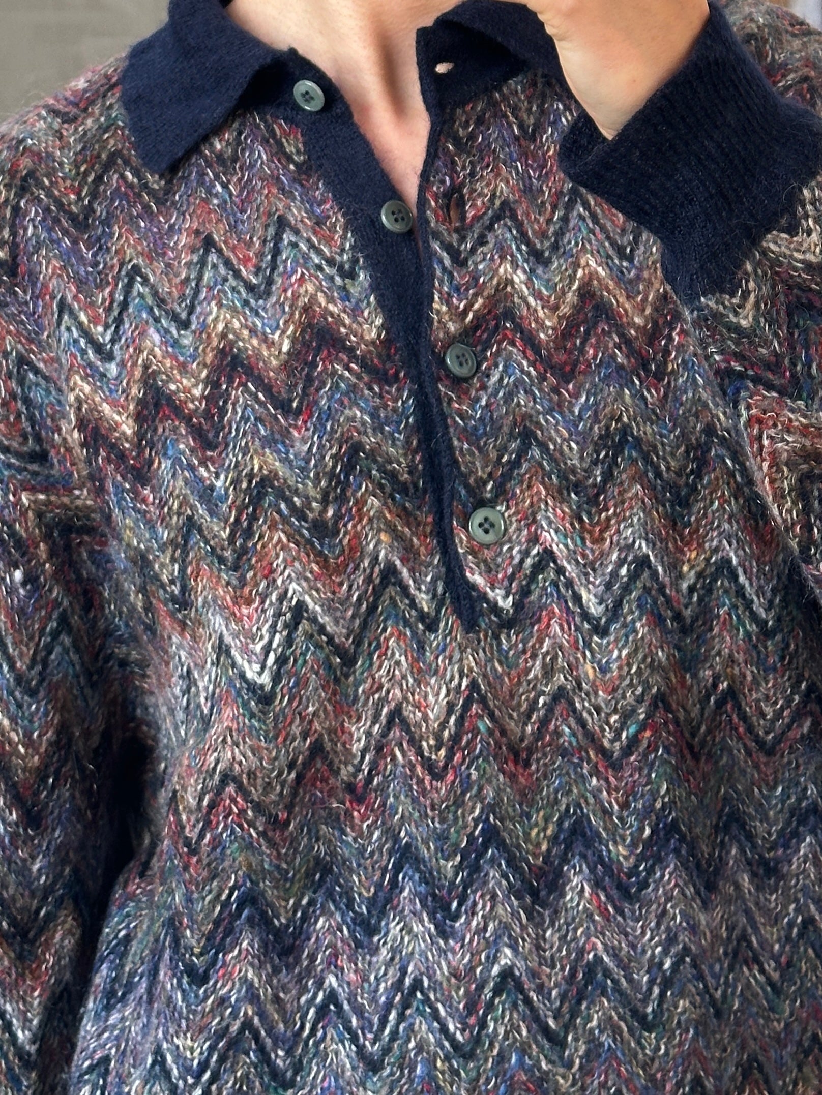 Vintage Italian 1990s mohair zig zag knit polo jumper, size L, featuring colorful zig zag pattern and classic knit texture.