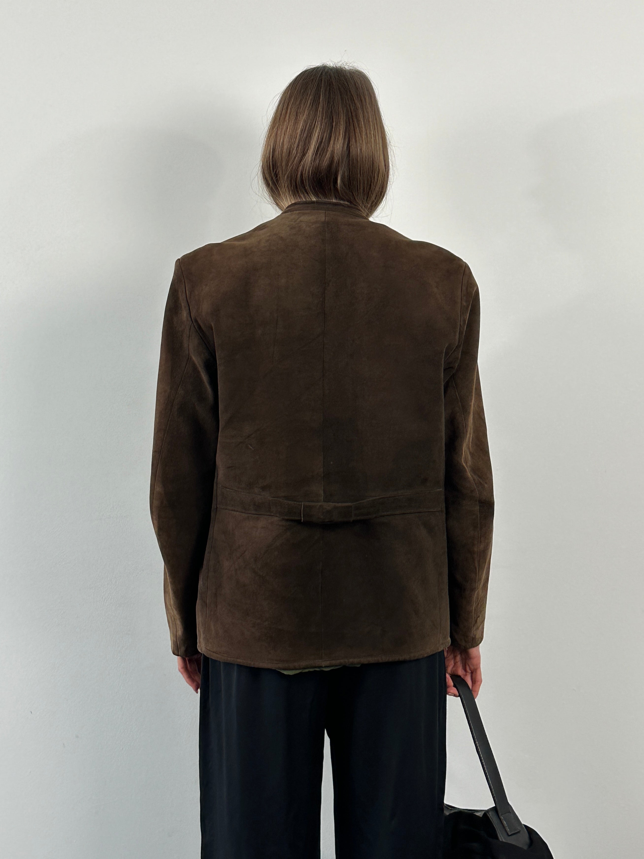 Vintage 1970s XL suede leather jacket with classic design and rich texture, featuring a collar and front button closure.