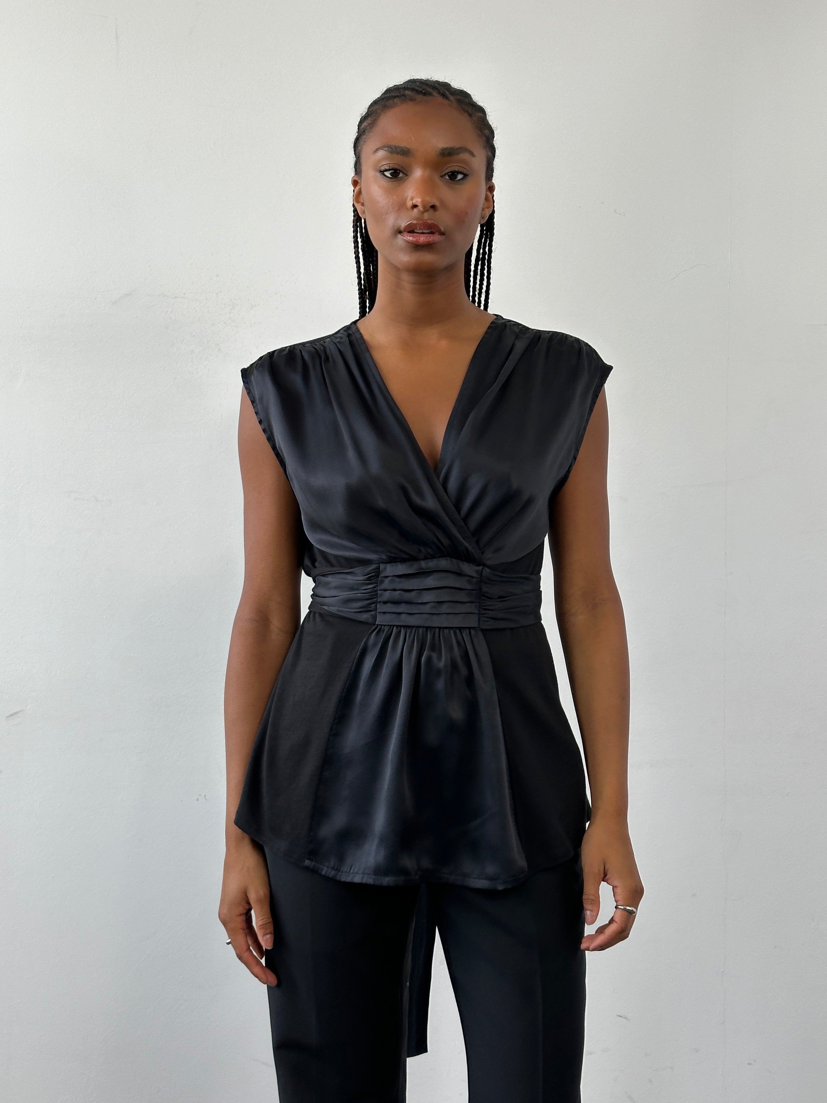 Jigsaw silk tie vest peplum top in size M, featuring a stylish sleeveless design and elegant fabric detail.