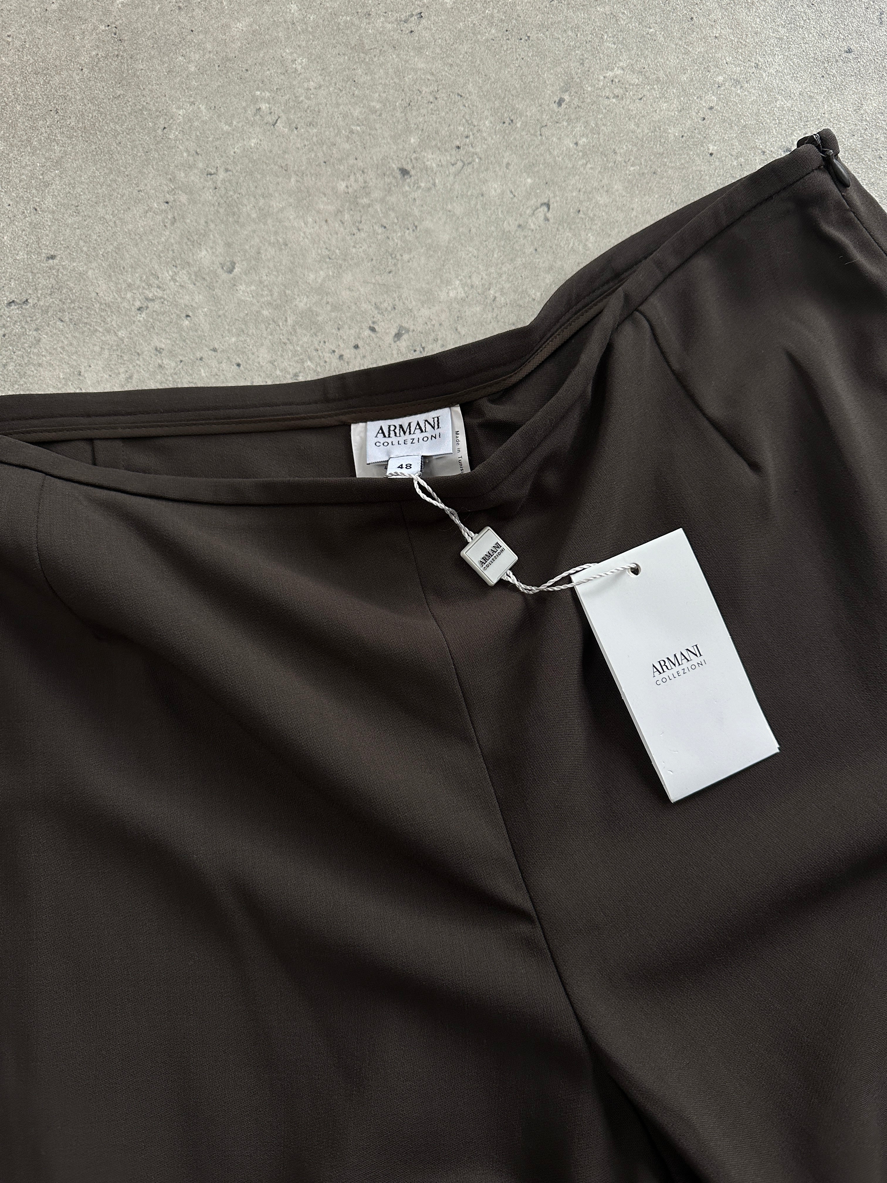 Armani Collezioni wide leg tailored wool trousers in size W34, featuring a classic fit and smooth fabric for a sophisticated look.
