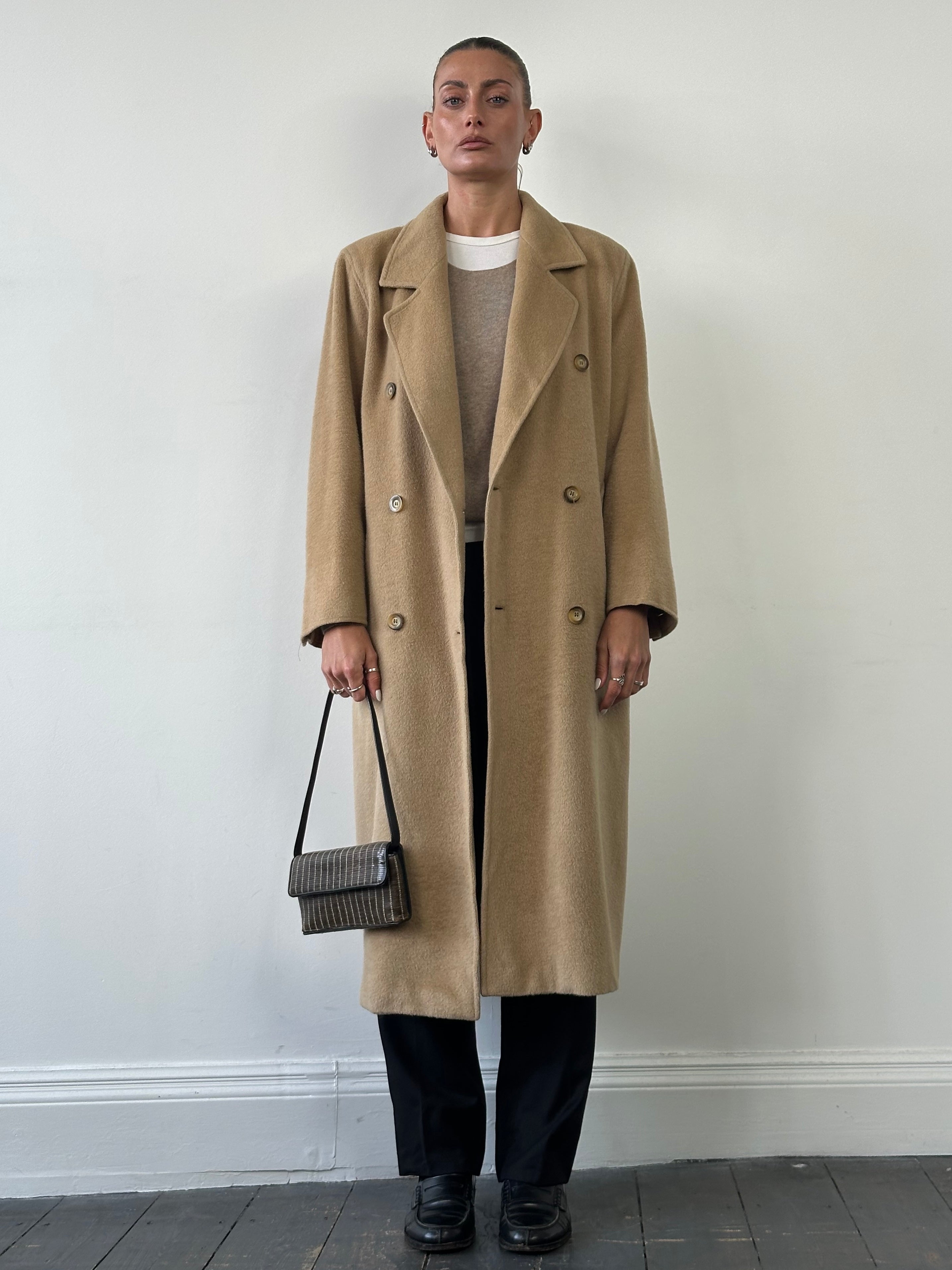 Max Mara wool camel hair double-breasted coat in M/L, shown on a hanger with classic lapels and tailored fit.
