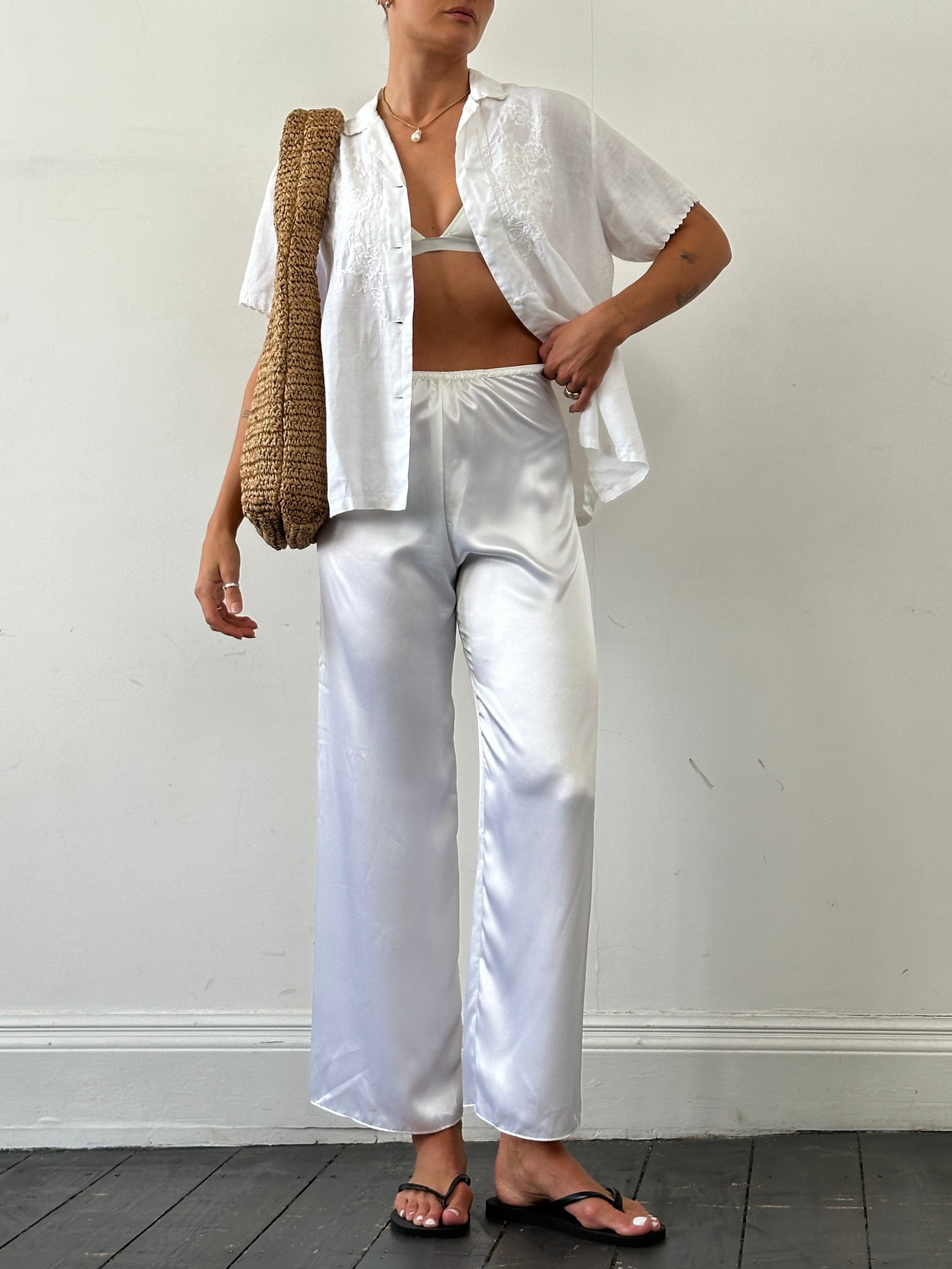 Vintage satin elasticated straight leg trousers in W25-28, showcasing smooth fabric and classic fit with a vintage style.