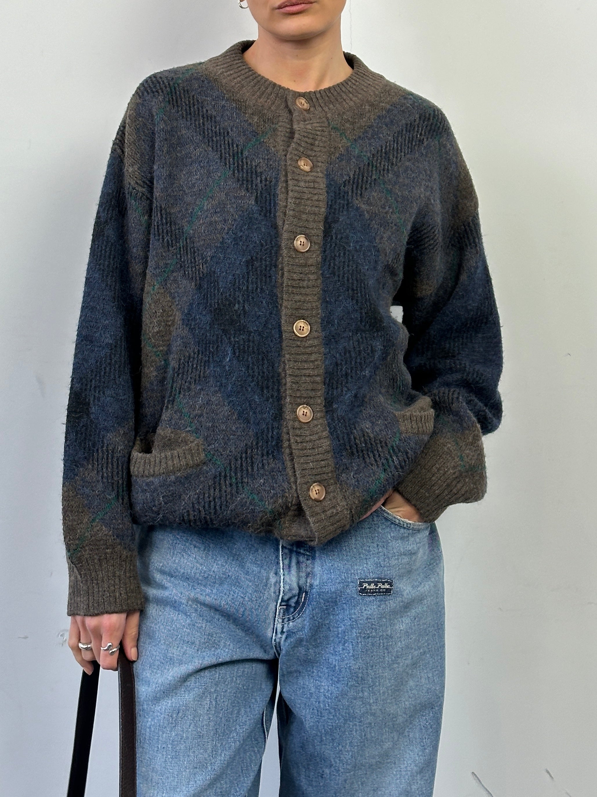 Vintage Italian vintage alpaca wool print cardigan in size L/XL, featuring a cozy, patterned design with button details.
