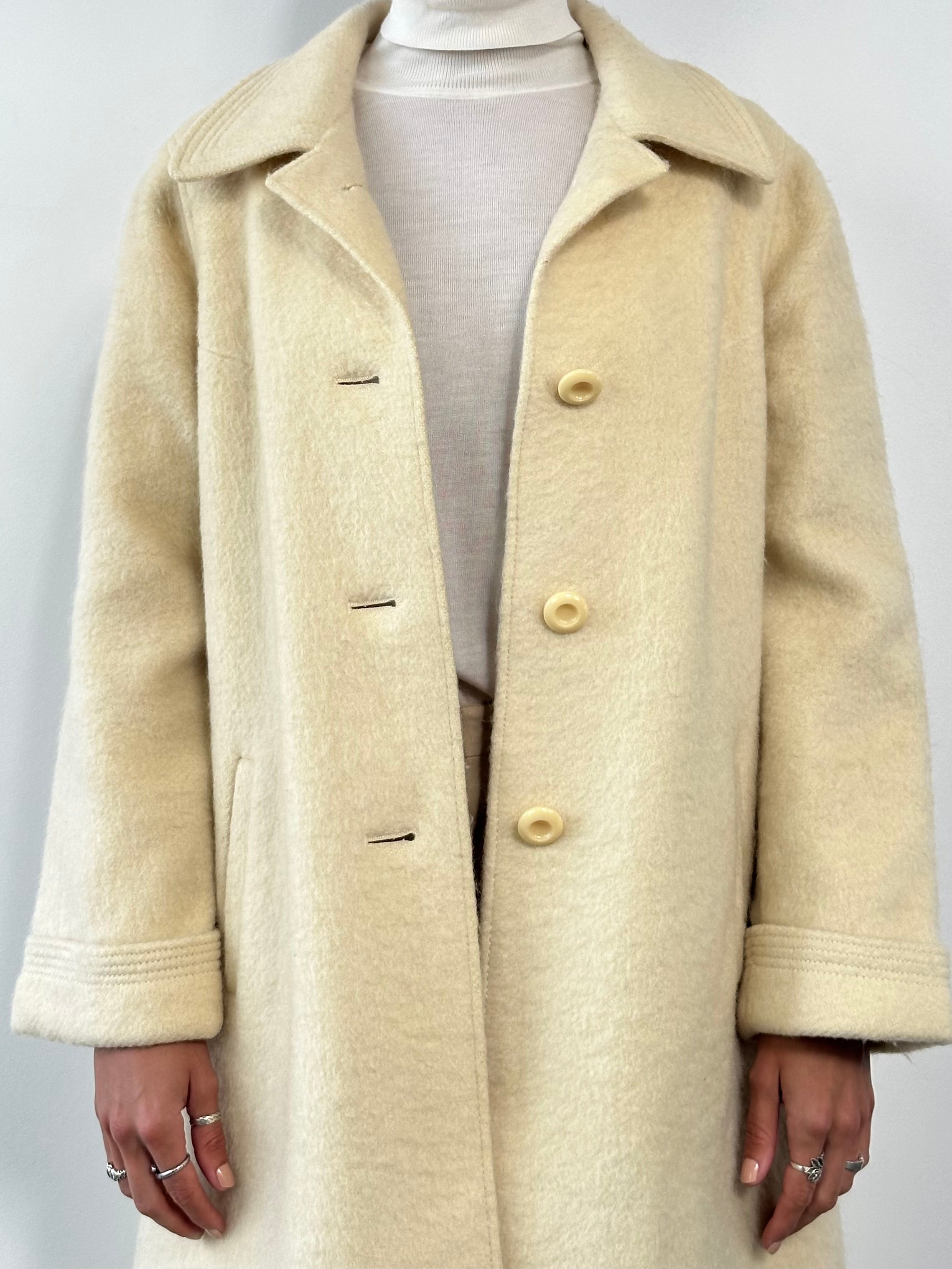 Vintage fuzzy wool mohair single-breasted coat, size large, featuring soft texture and classic design, ideal for stylish winter wear.