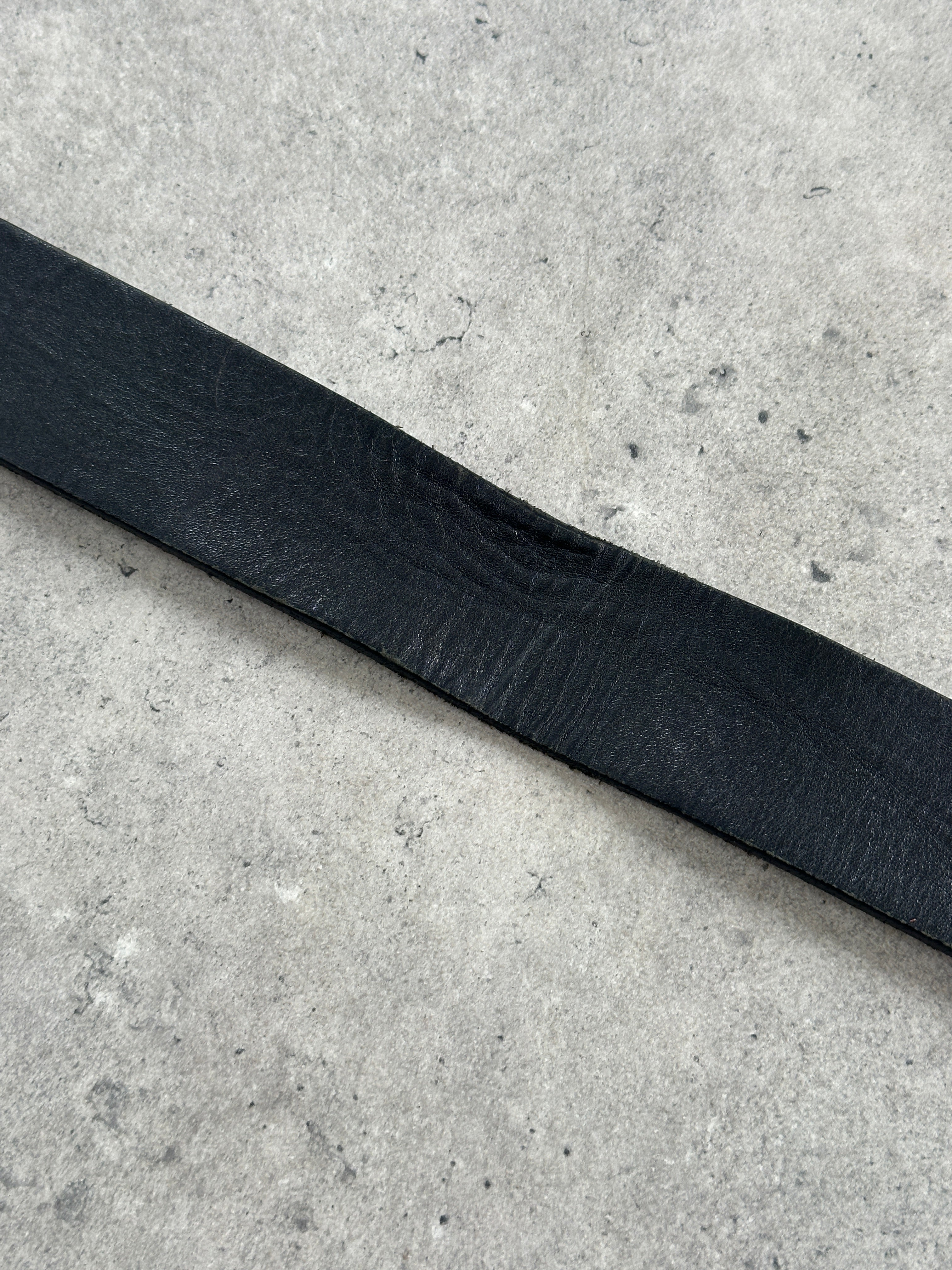 Vintage 2000s chrome leather belt, 30-34 inch, featuring a shiny metallic finish and classic buckle design.