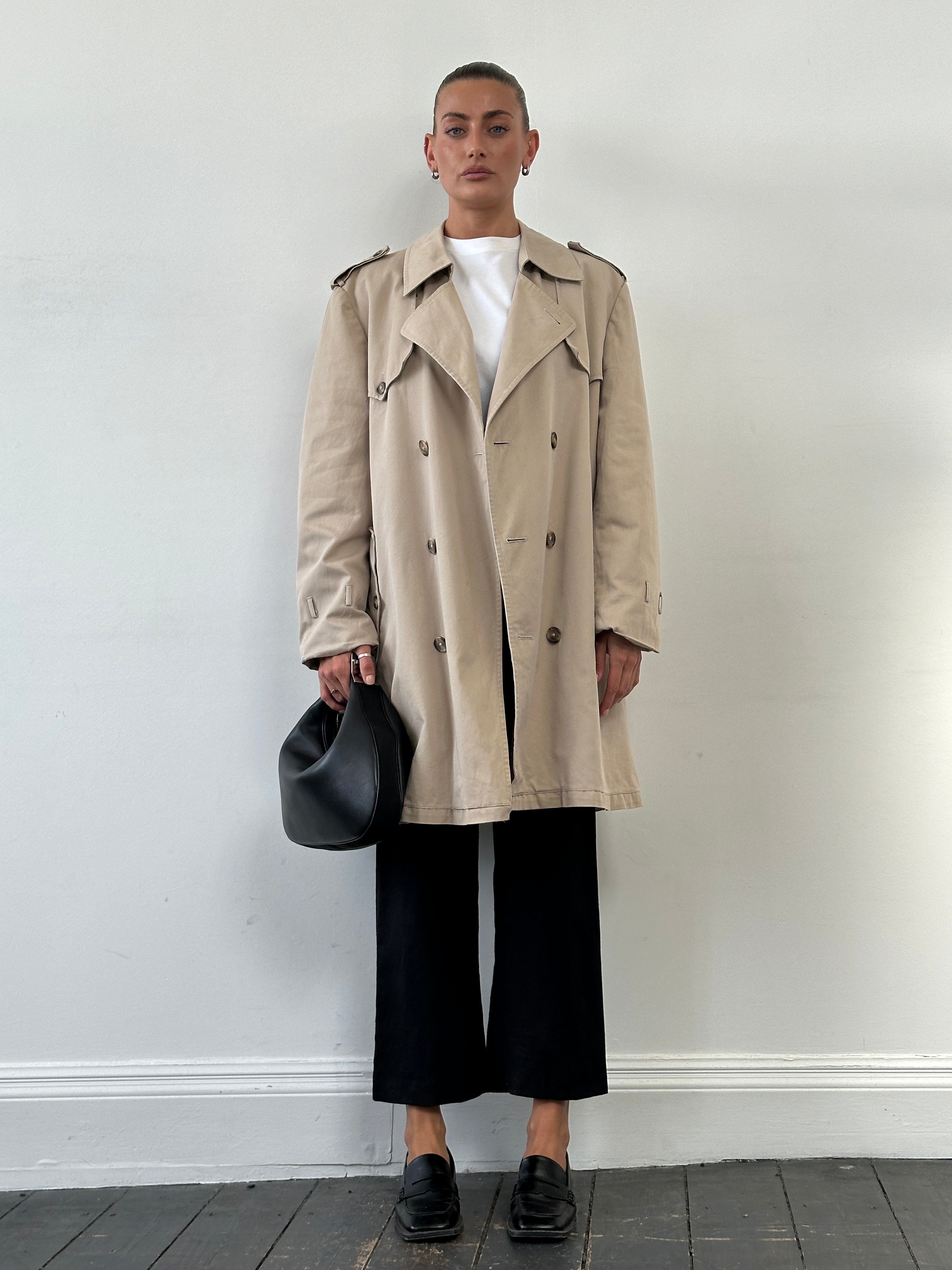 Christian Dior Monsieur cotton double-breasted belted trench coat in beige, size large/X-large, shown with classic collar and button details.