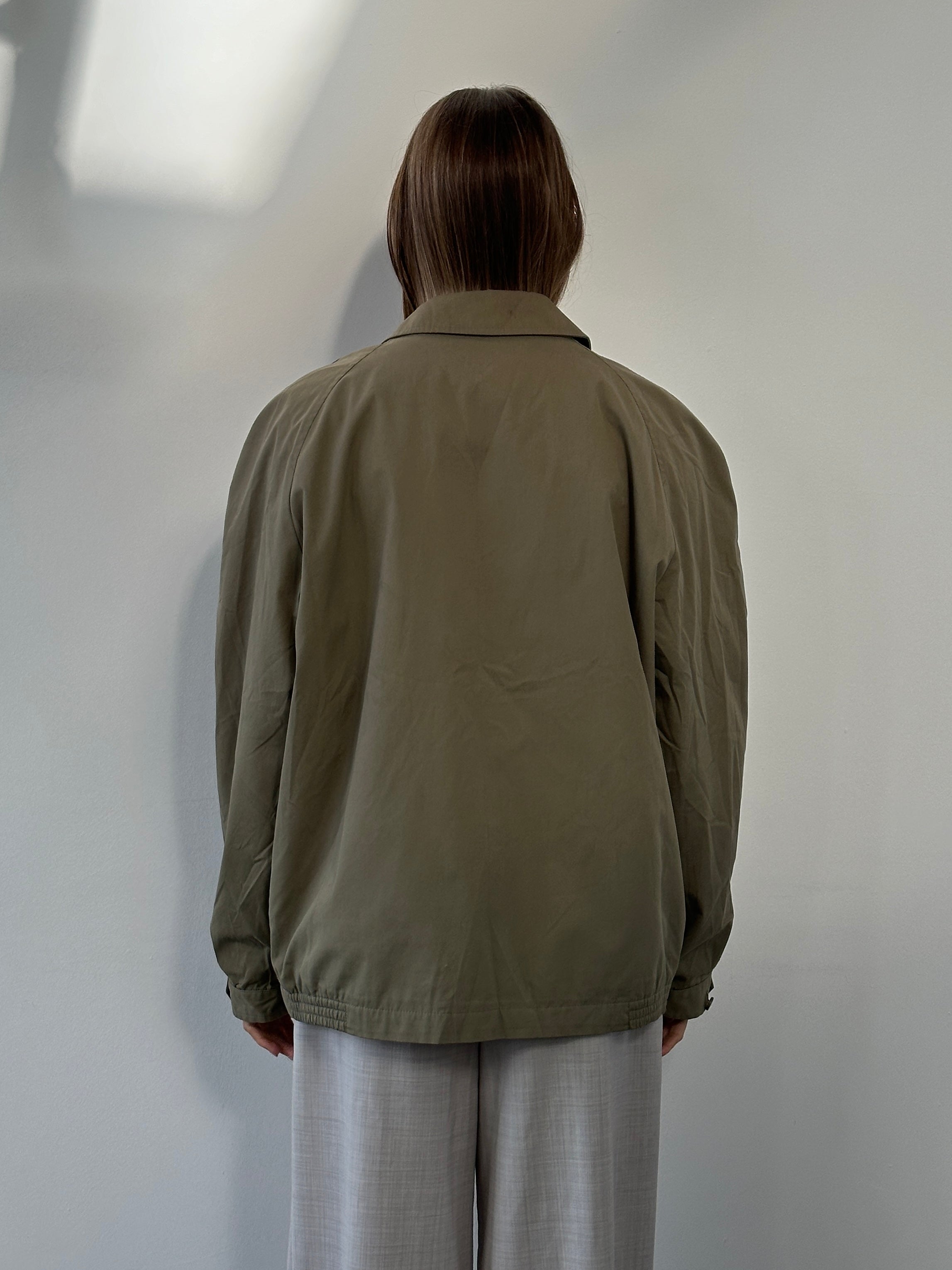 Burberry 1990s wool logo bomber jacket in XL with classic design and signature branding, shown on a hanger.