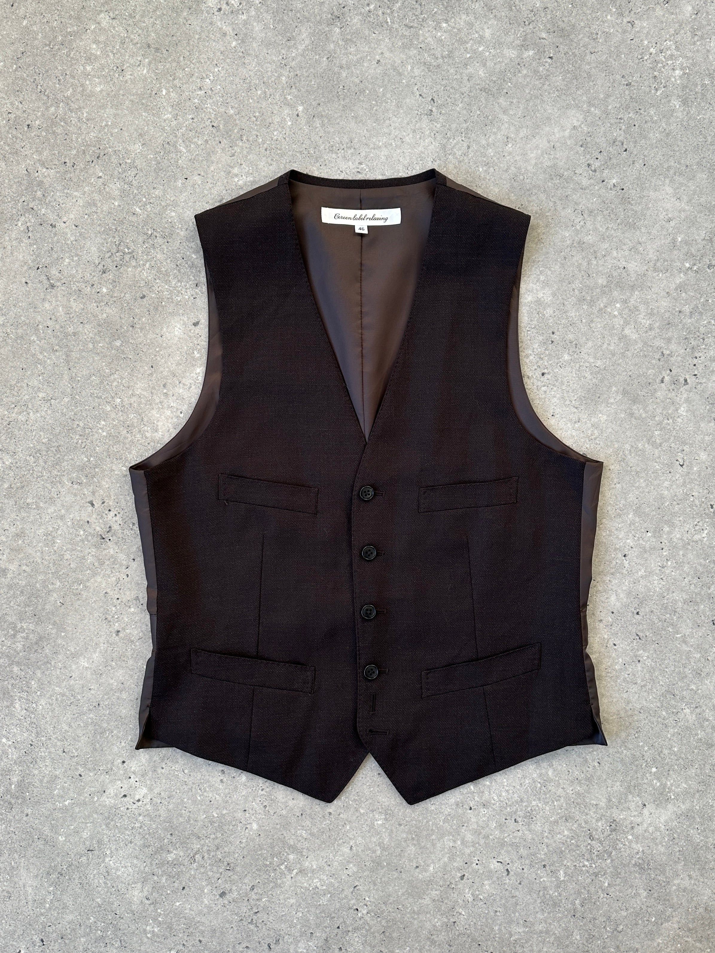 Vintage wool waistcoat coat in size M, featuring classic design and warm fabric, perfect for retro-inspired fashion.