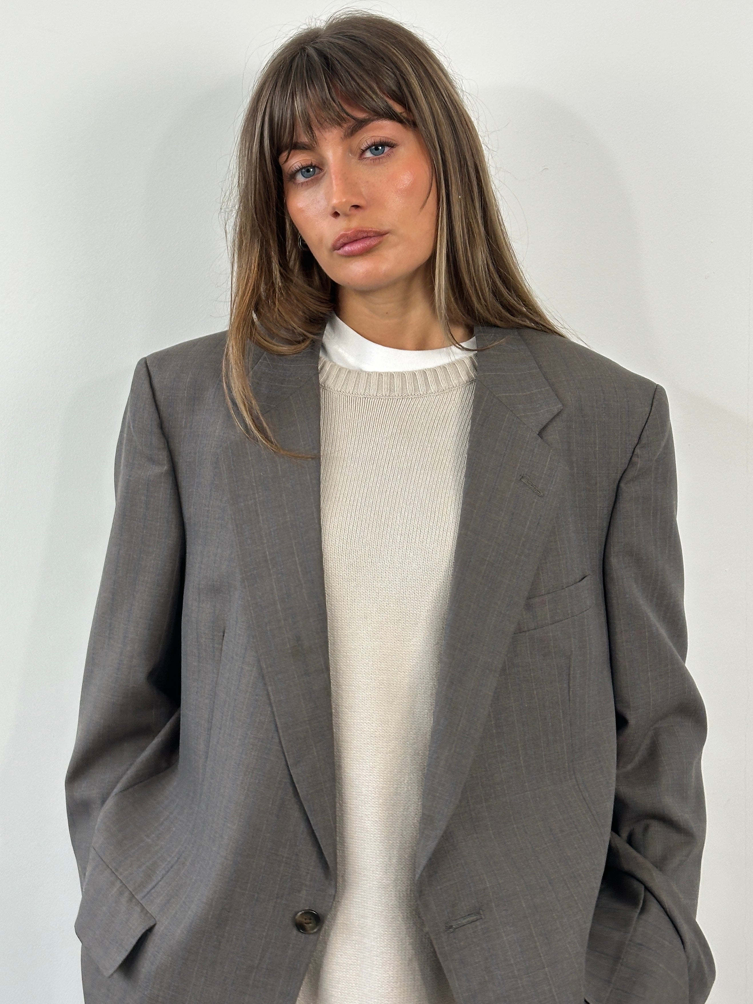 Christian Dior Monsieur 1990s striped single-breasted blazer, size 44R/XL, shown on a hanger with classic tailored design.