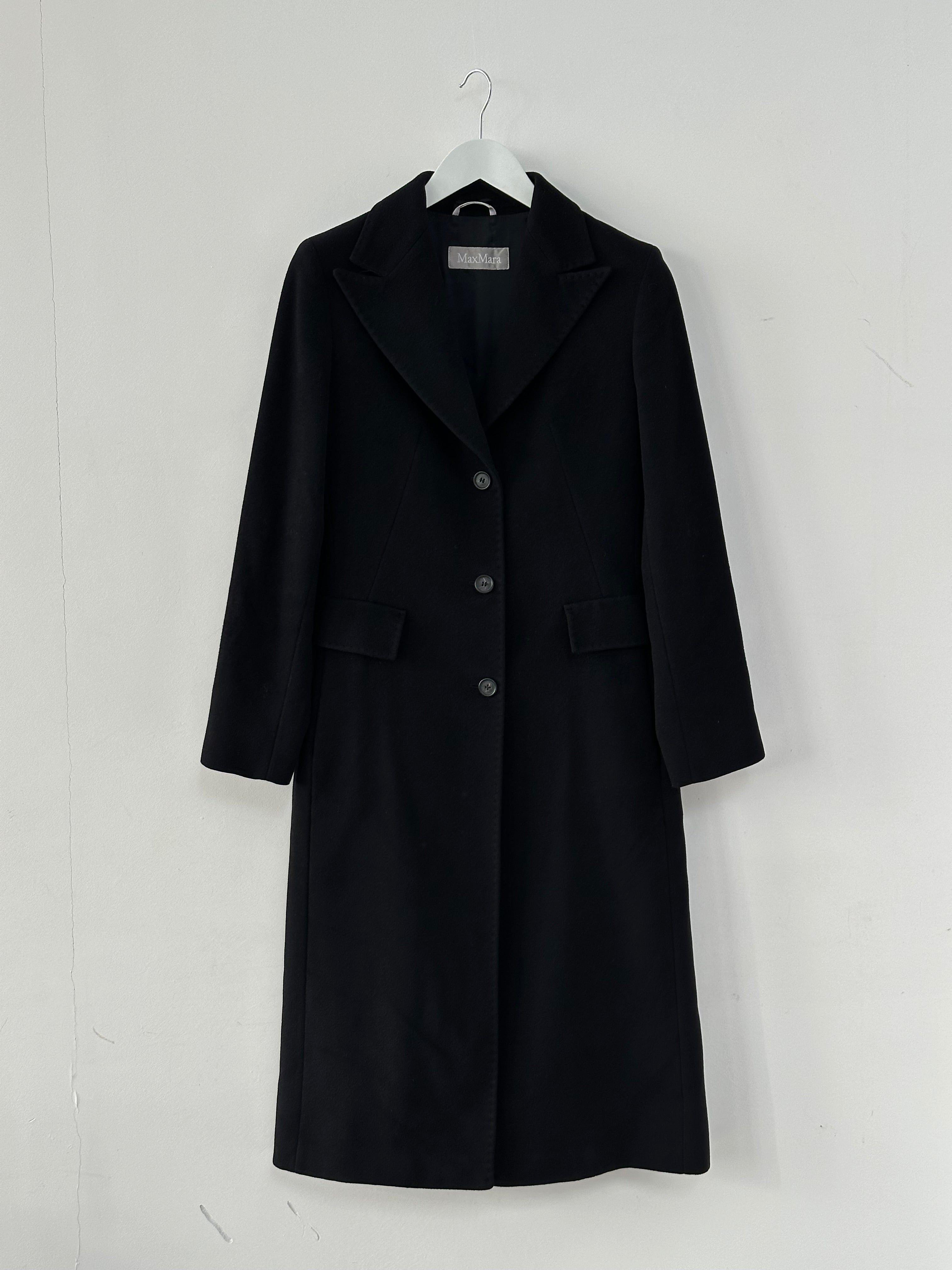 Max Mara pure wool single-breasted coat in size S, shown on a hanger, featuring classic tailored style and neutral color.