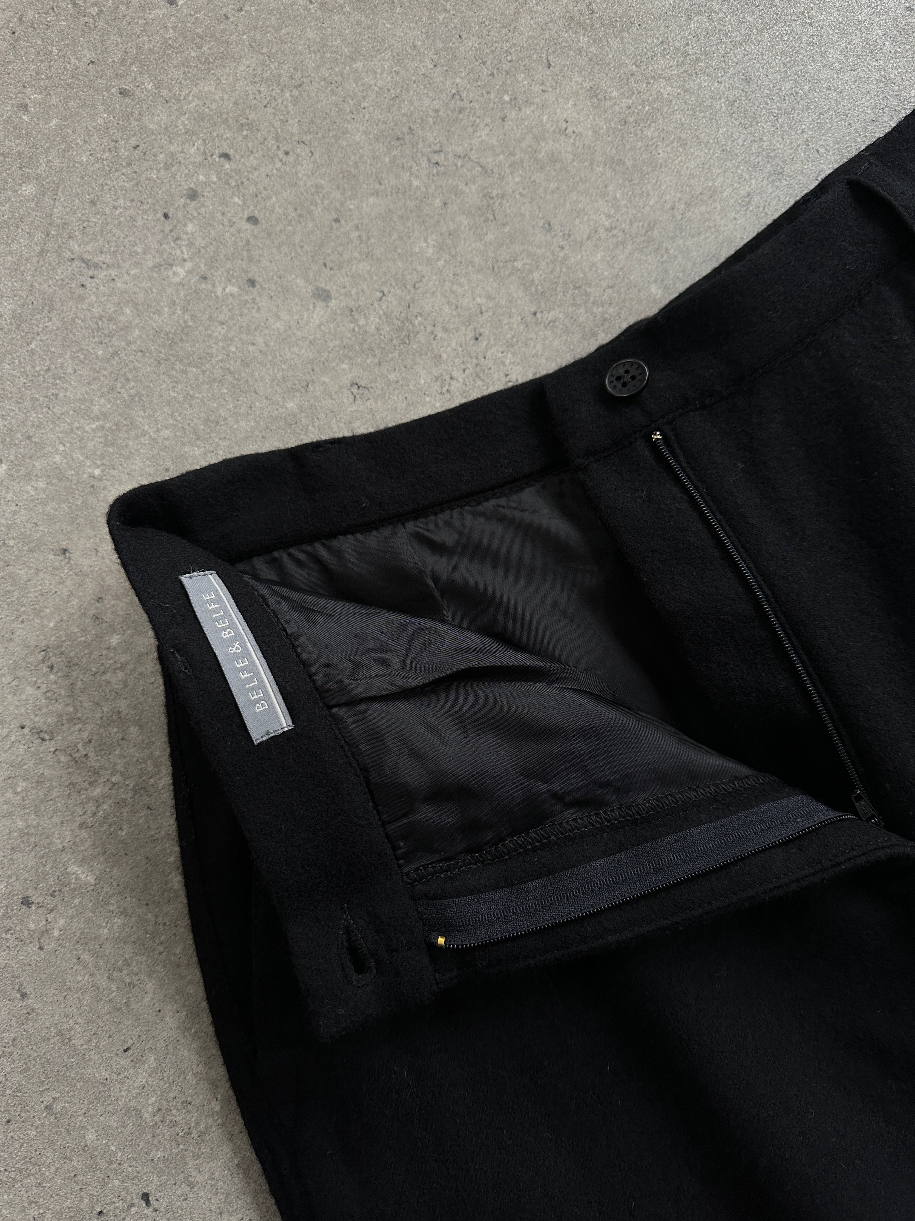 Belfe & Belfe 1990s pure wool maxi skirt in W26, featuring a long, flowing design with a textured fabric appearance.