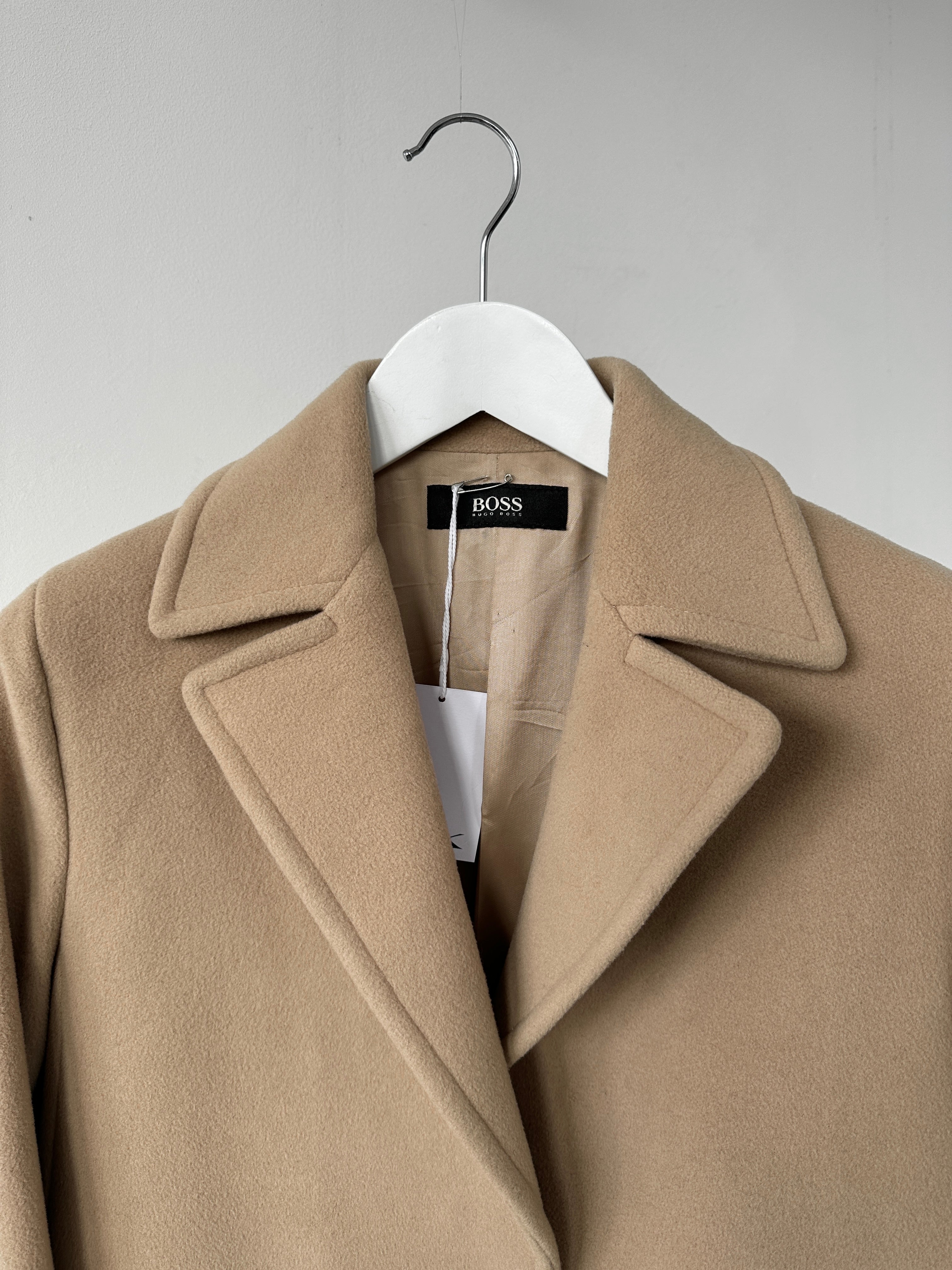 Hugo Boss pure wool single-breasted coat in size S, gray color, tailored fit, displayed on a hanger.