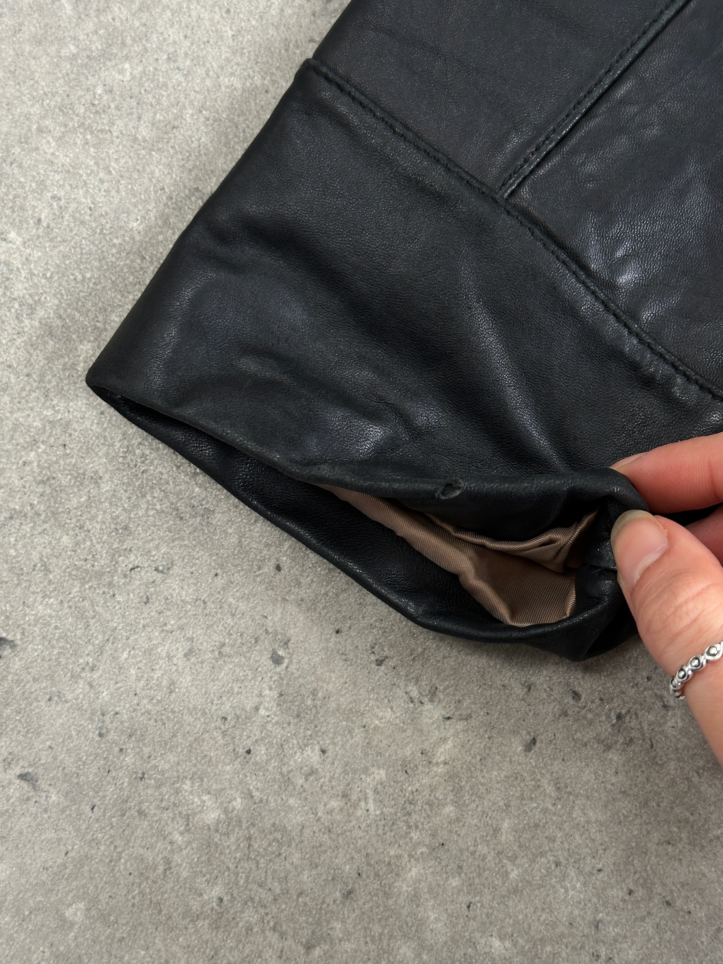 Balmain smooth leather jacket in XL size, stylish men's or women's black leather jacket with a sleek finish and classic design.