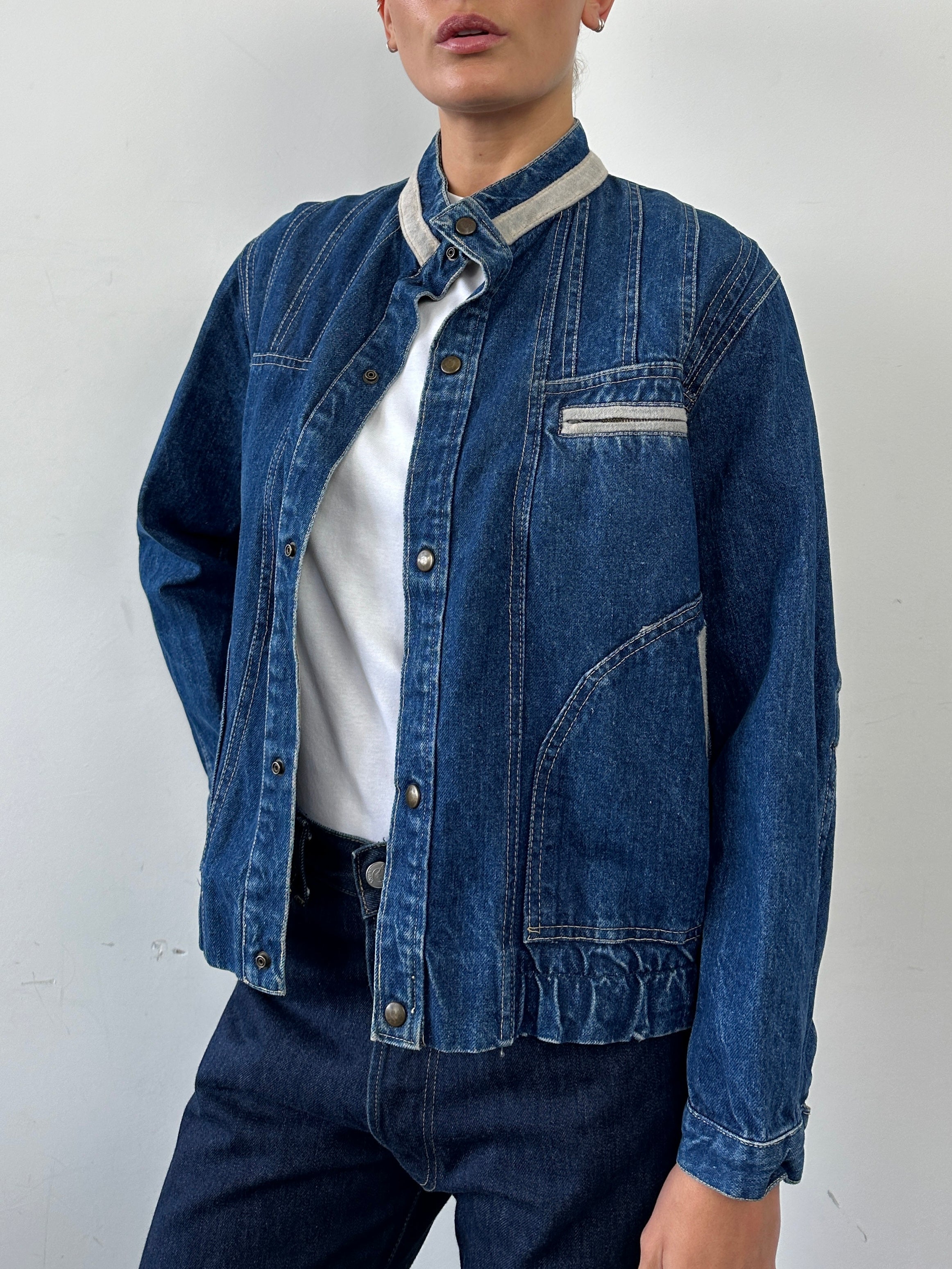Vintage contrast stitch denim jacket in size S/M, featuring classic design and durable denim fabric.