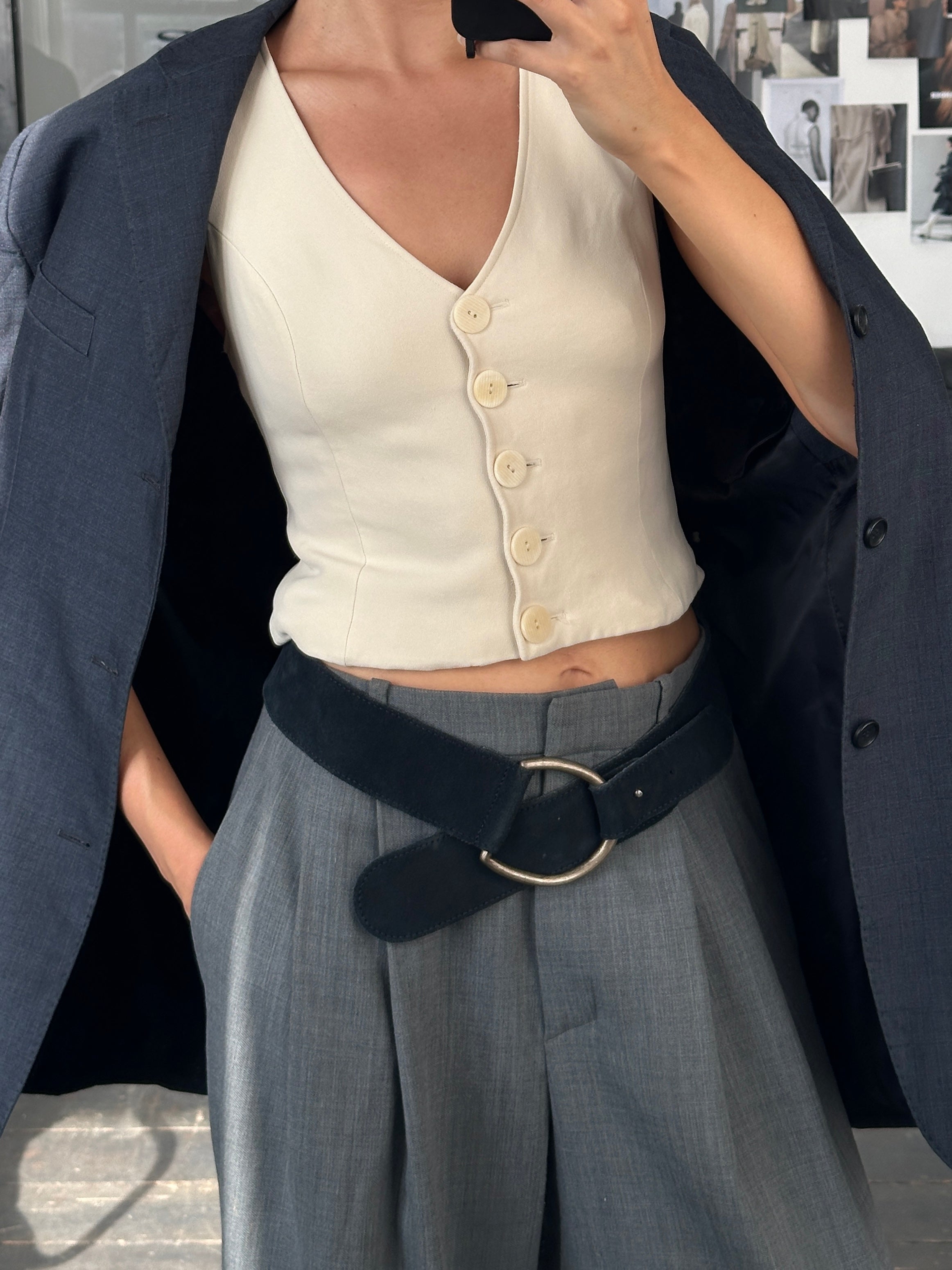 Vintage French 1980s tailored waistcoat in size M, classic design with structured fit and detailed stitching.