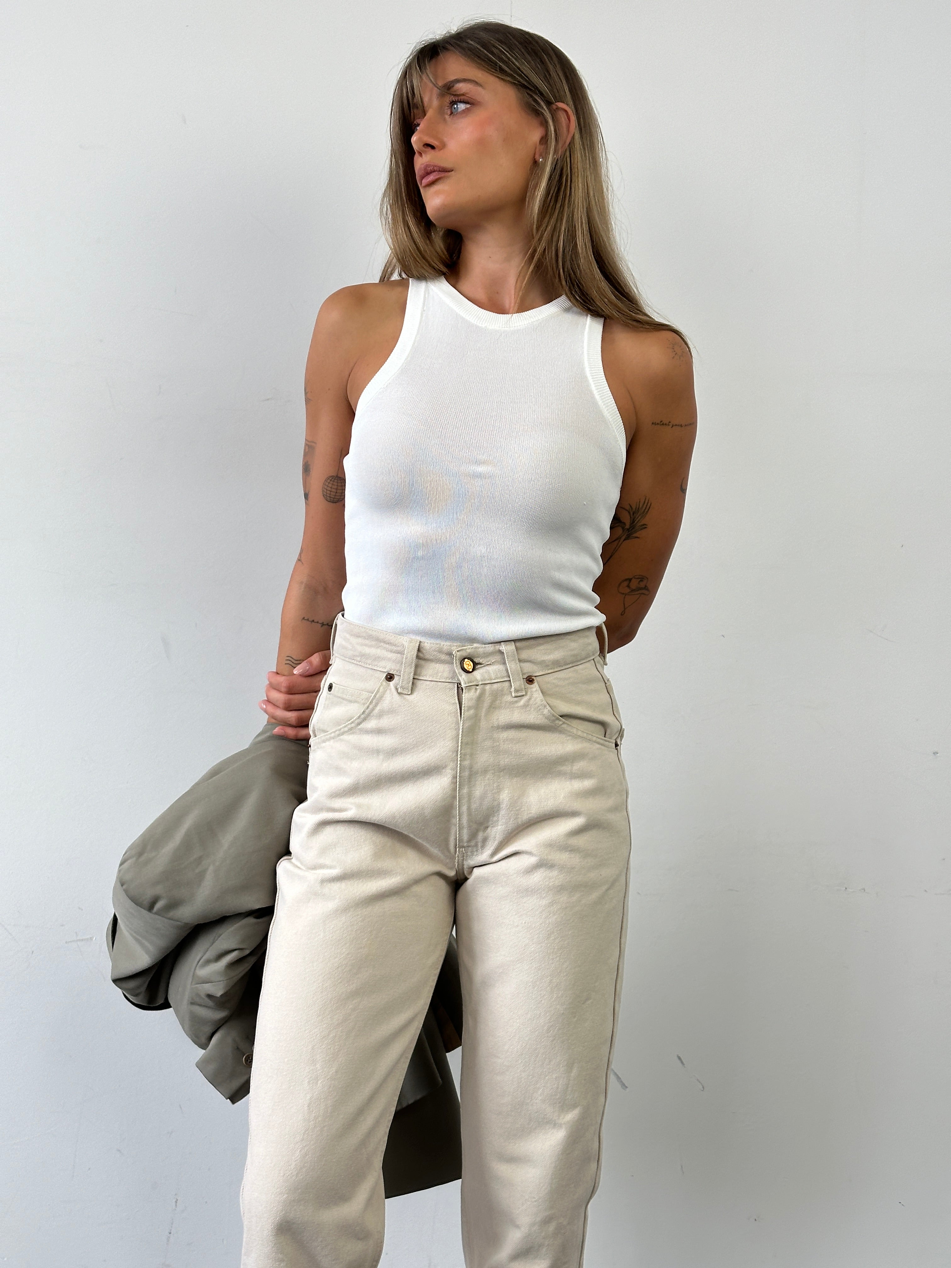 Valentino pure cotton high waisted denim jeans in W26, featuring classic five-pocket design and a dark blue wash.