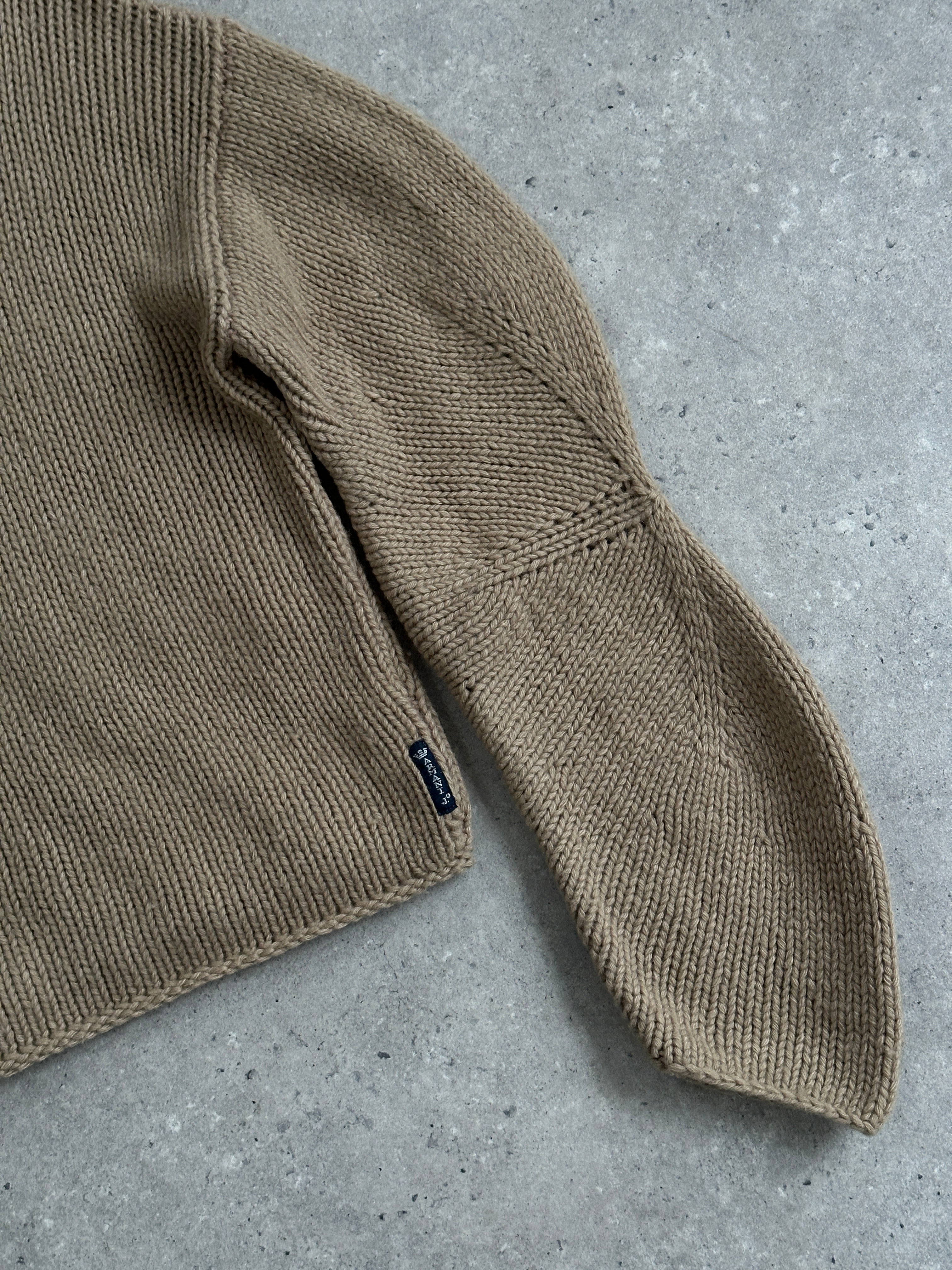 Armani Jeans wool roll neck jumper in size M, featuring a cozy knit design and classic fit in neutral tones.