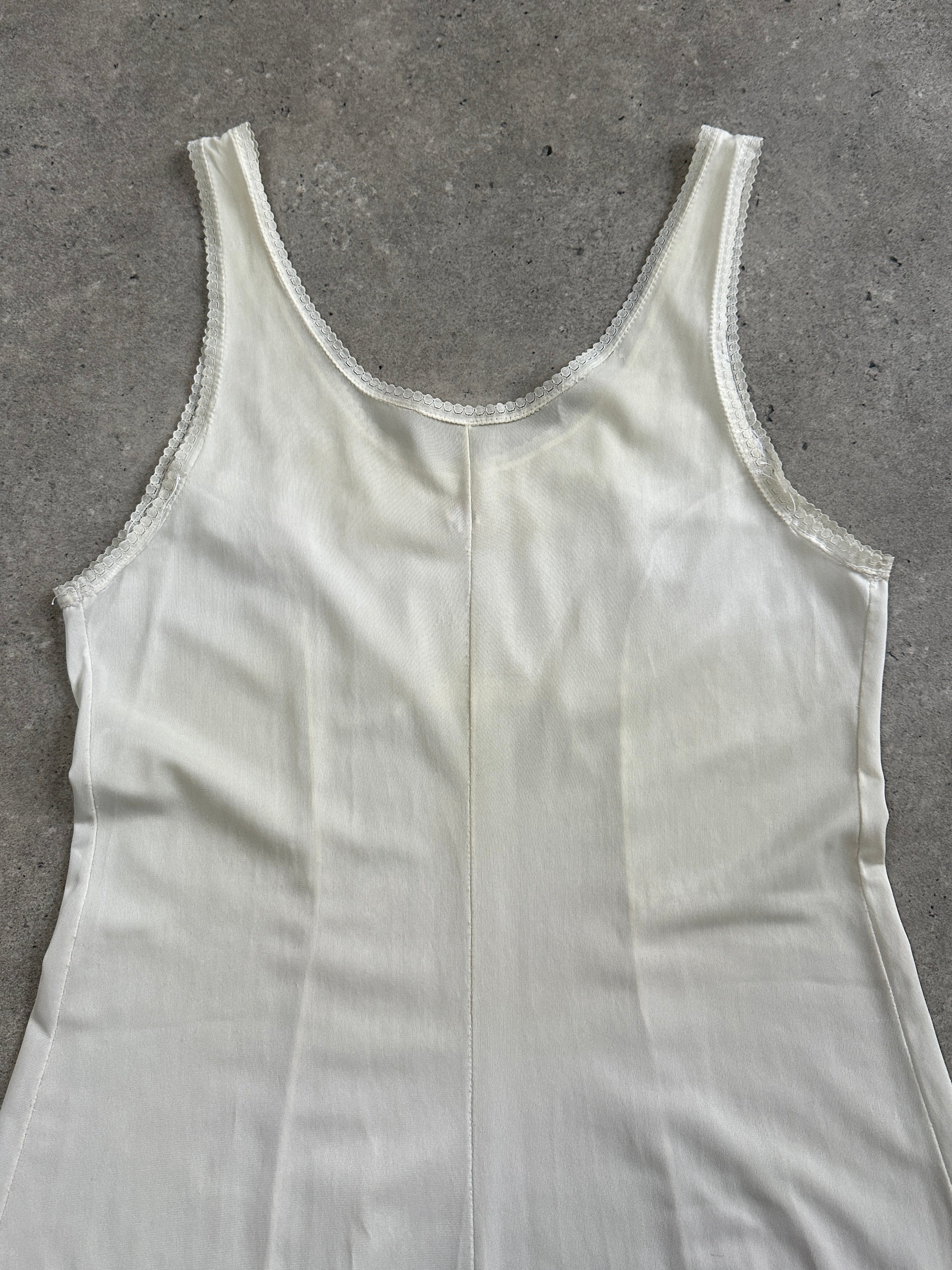 Vintage 1990s lace mini slip dress in size small, featuring delicate lace fabric and a classic vintage style.