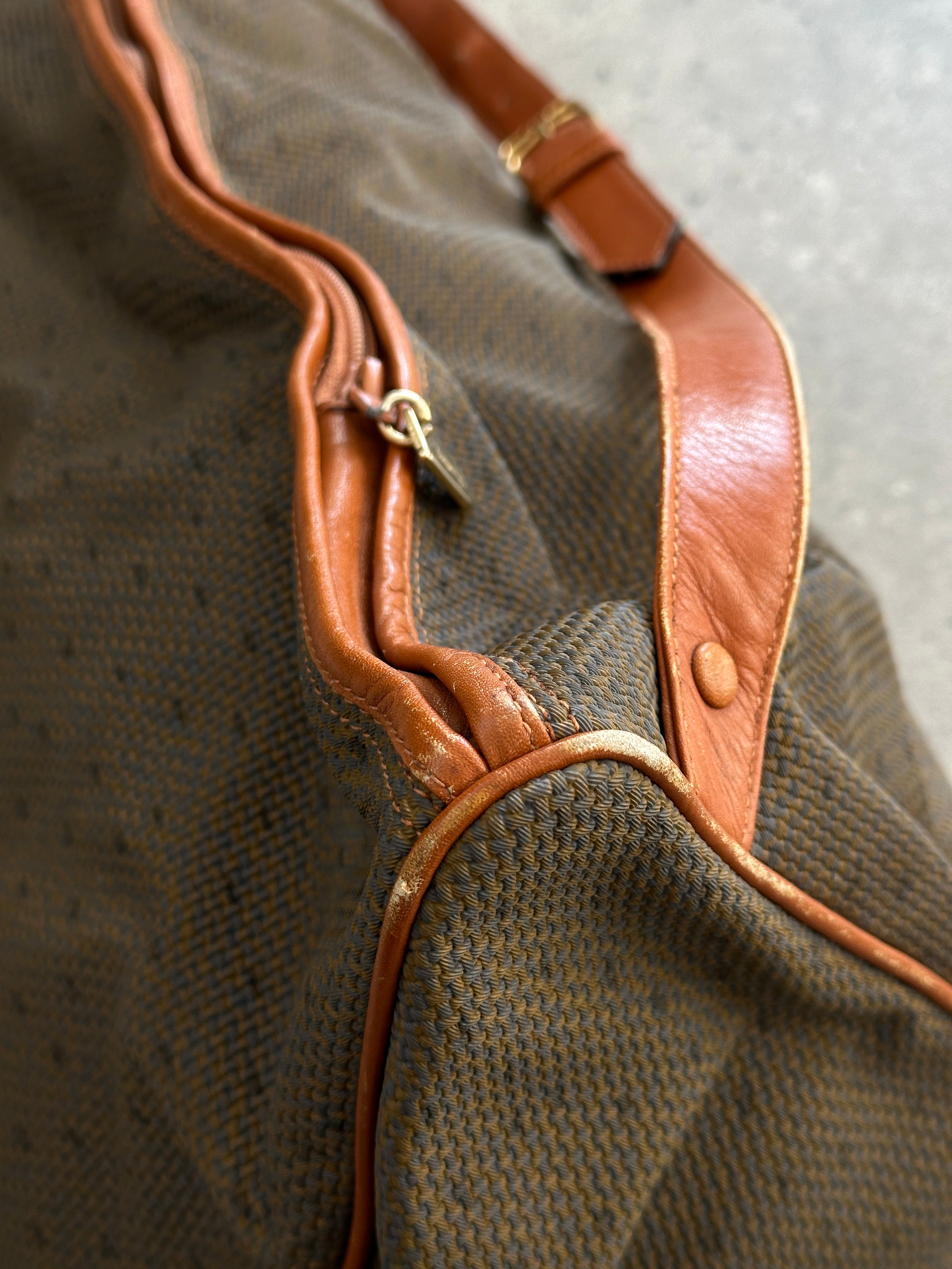 Yves Saint Laurent Paris 80s leather sling bag with sleek design and adjustable strap, crafted from high-quality leather.