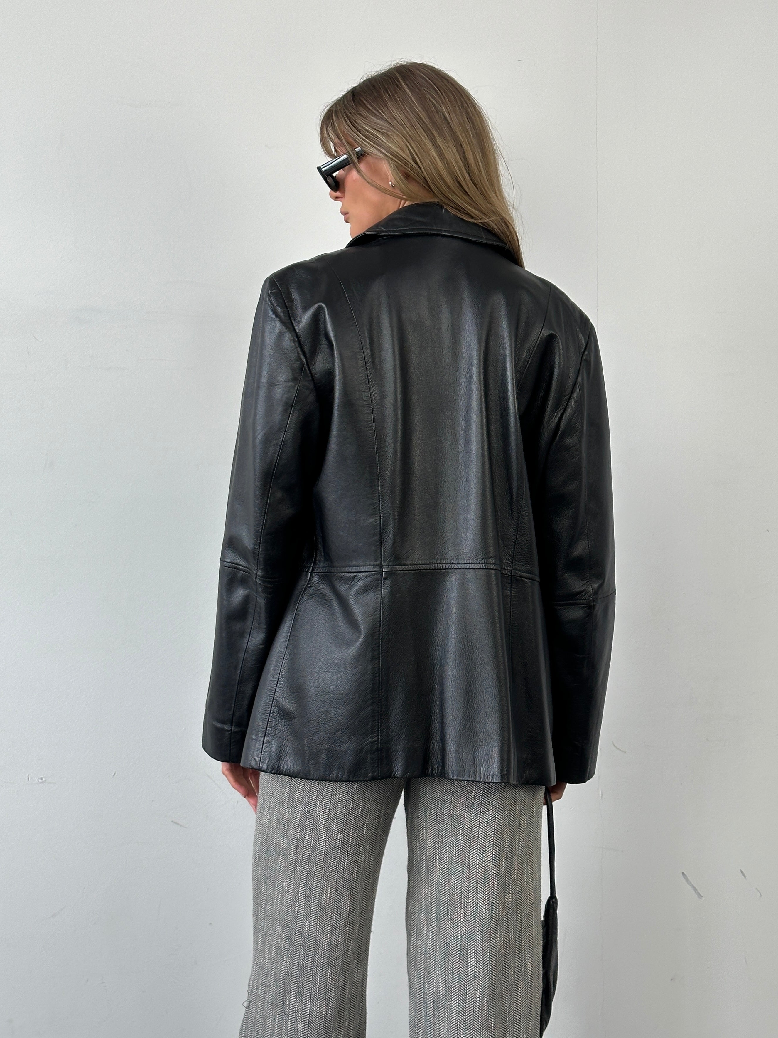 Marella smooth leather jacket in size M, featuring a classic design with a sleek black finish and tailored fit.