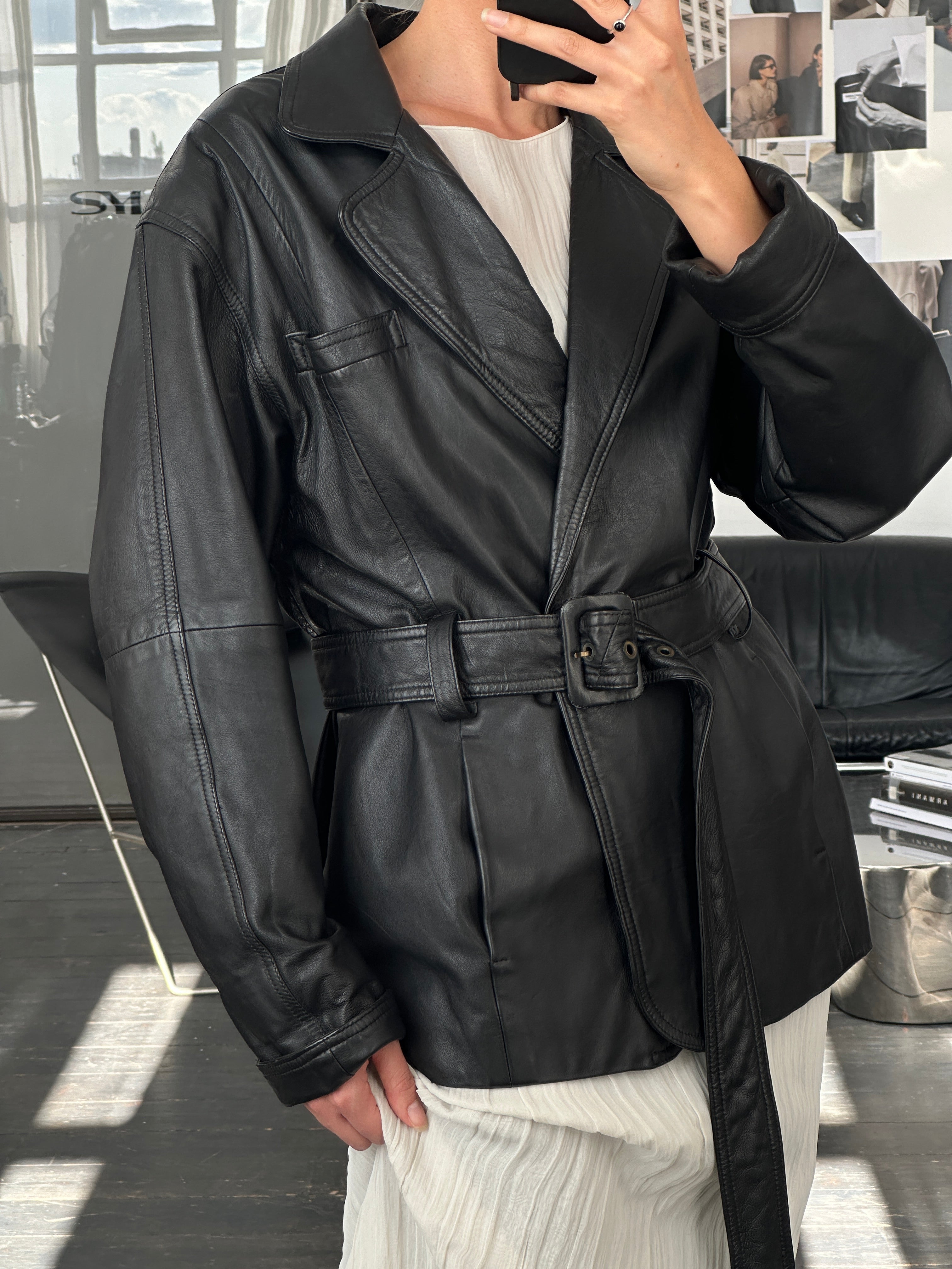 Vintage 90s leather belted jacket, size large, featuring classic design and durable leather material.